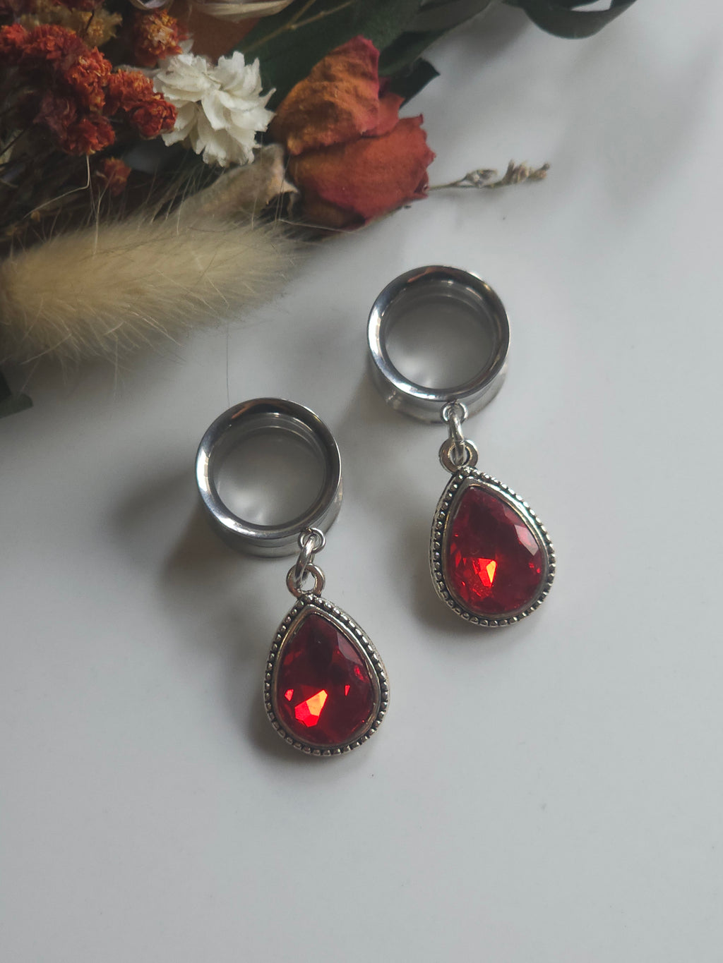 Red/Green teardrop dangle plugs dangle gauges.  Christmas