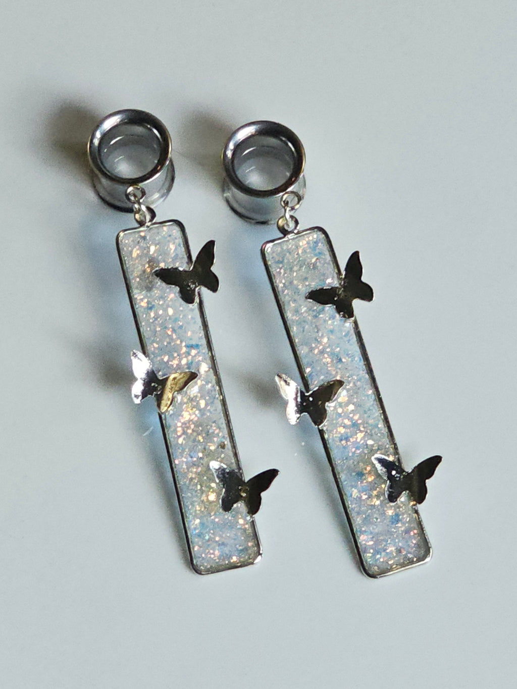 Butterfly dangle gauges