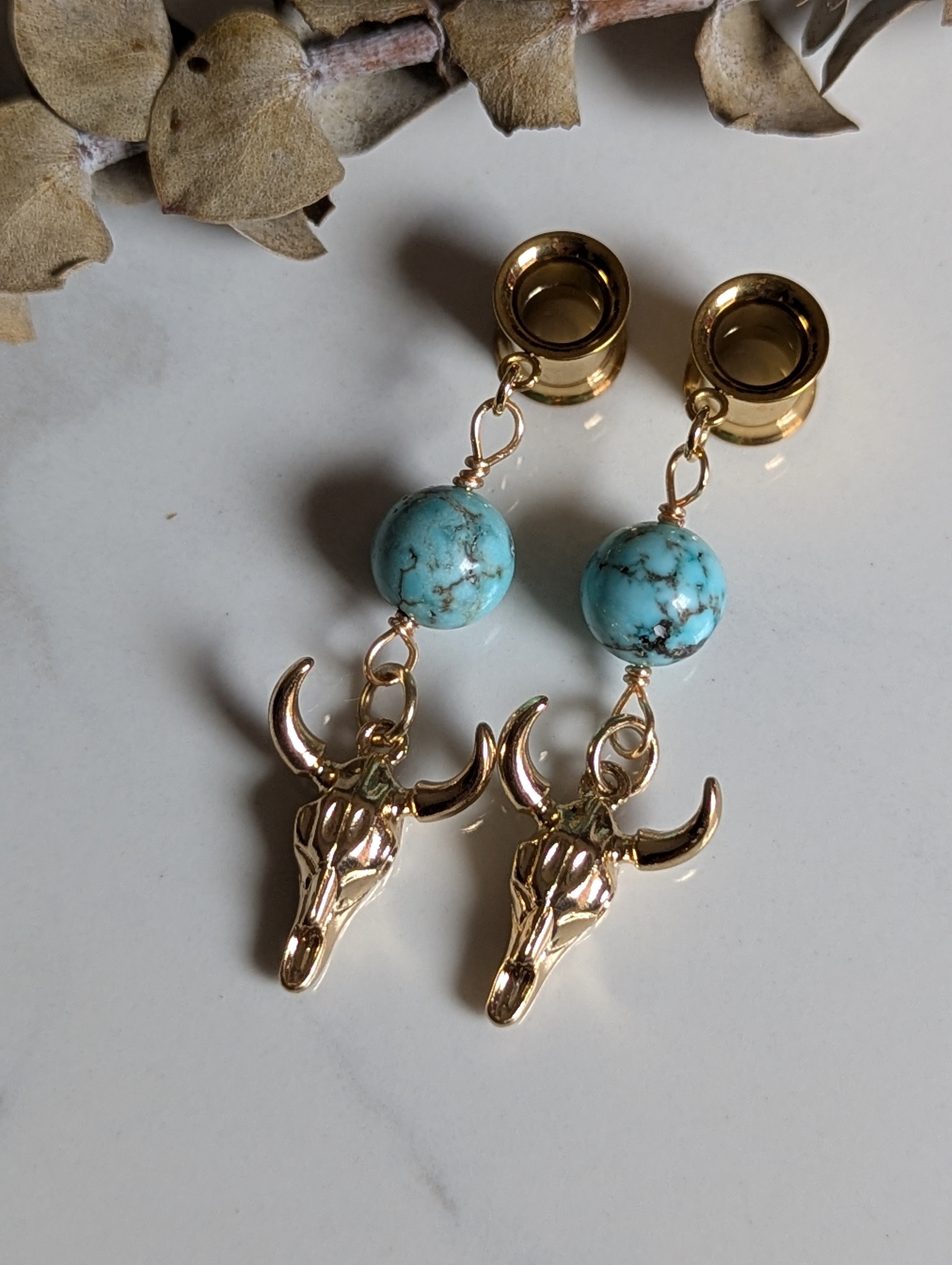Western cow skull dangle gauges