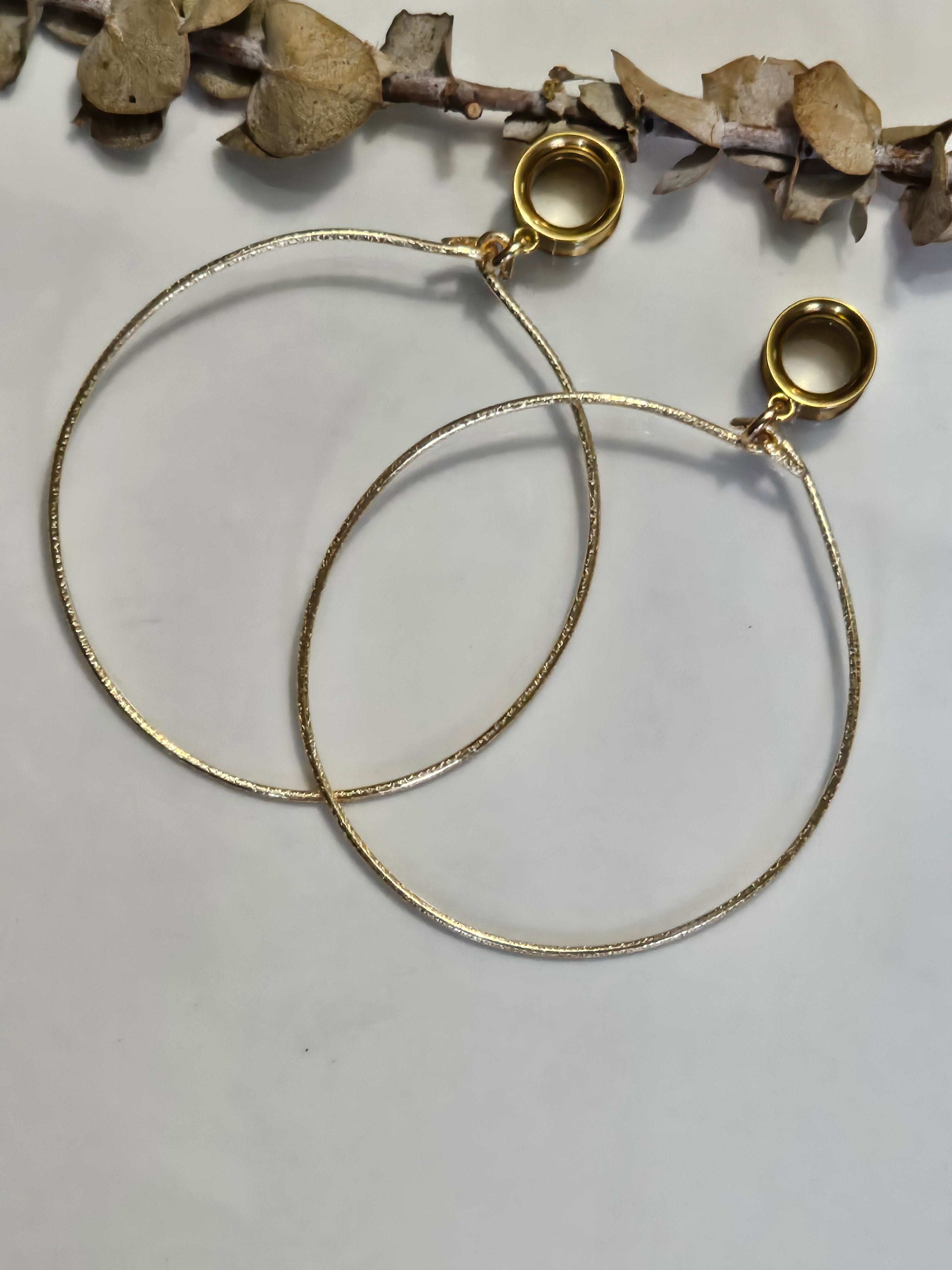 Large hoop dangle gauges