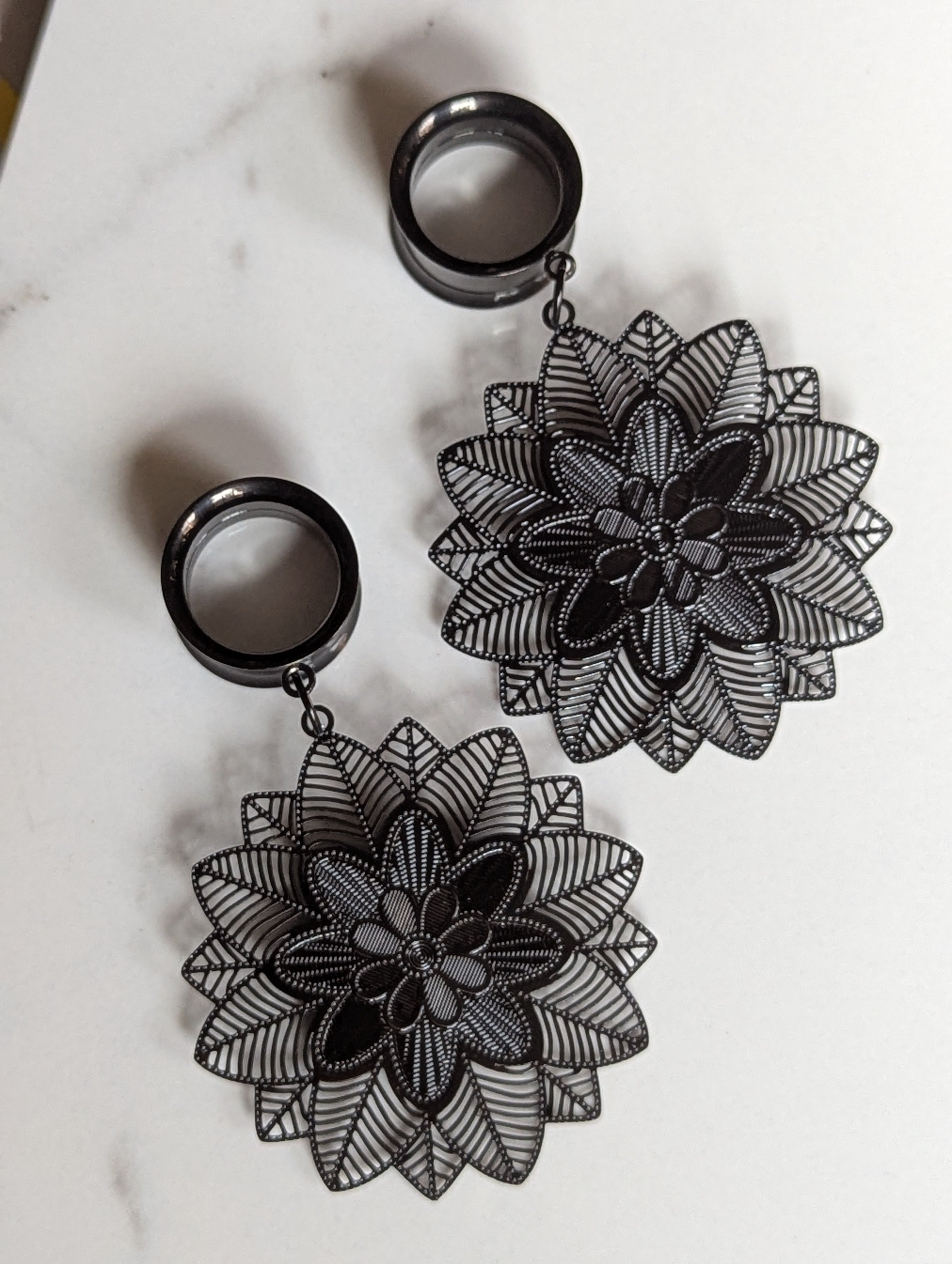Black floral dangle gauges