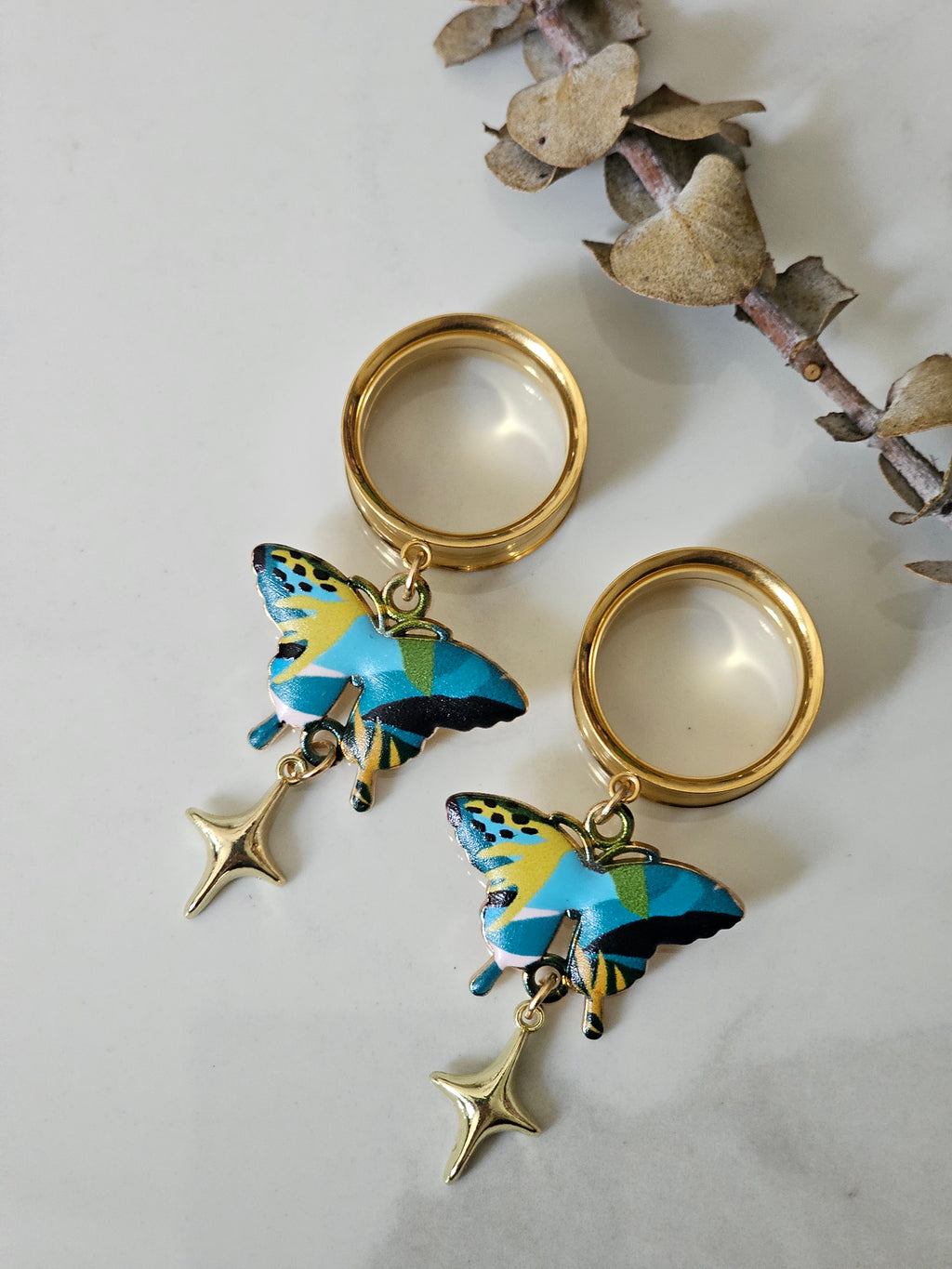 Blue butterfly dangle gauges