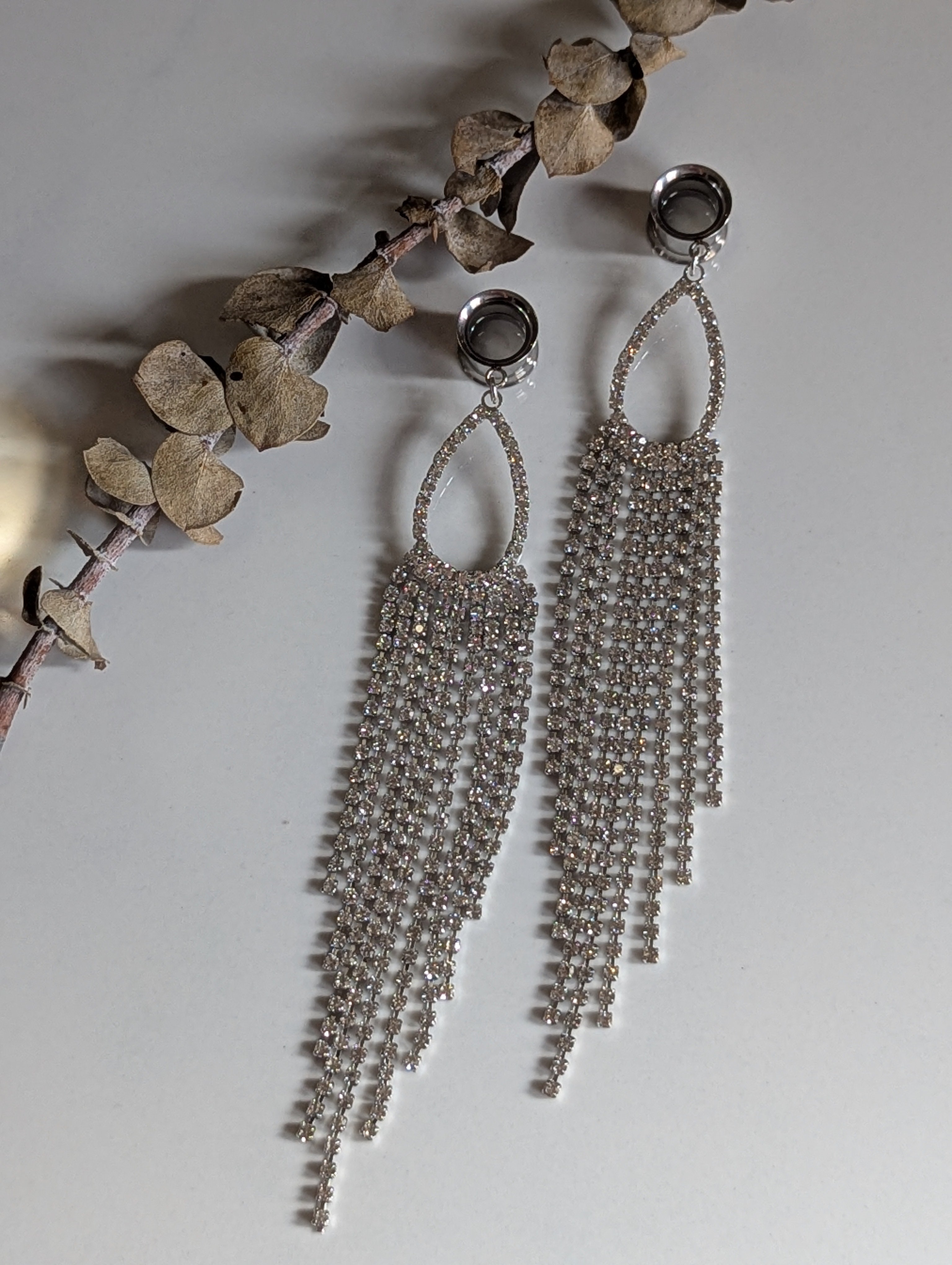 Diamond tassel dangle gauges