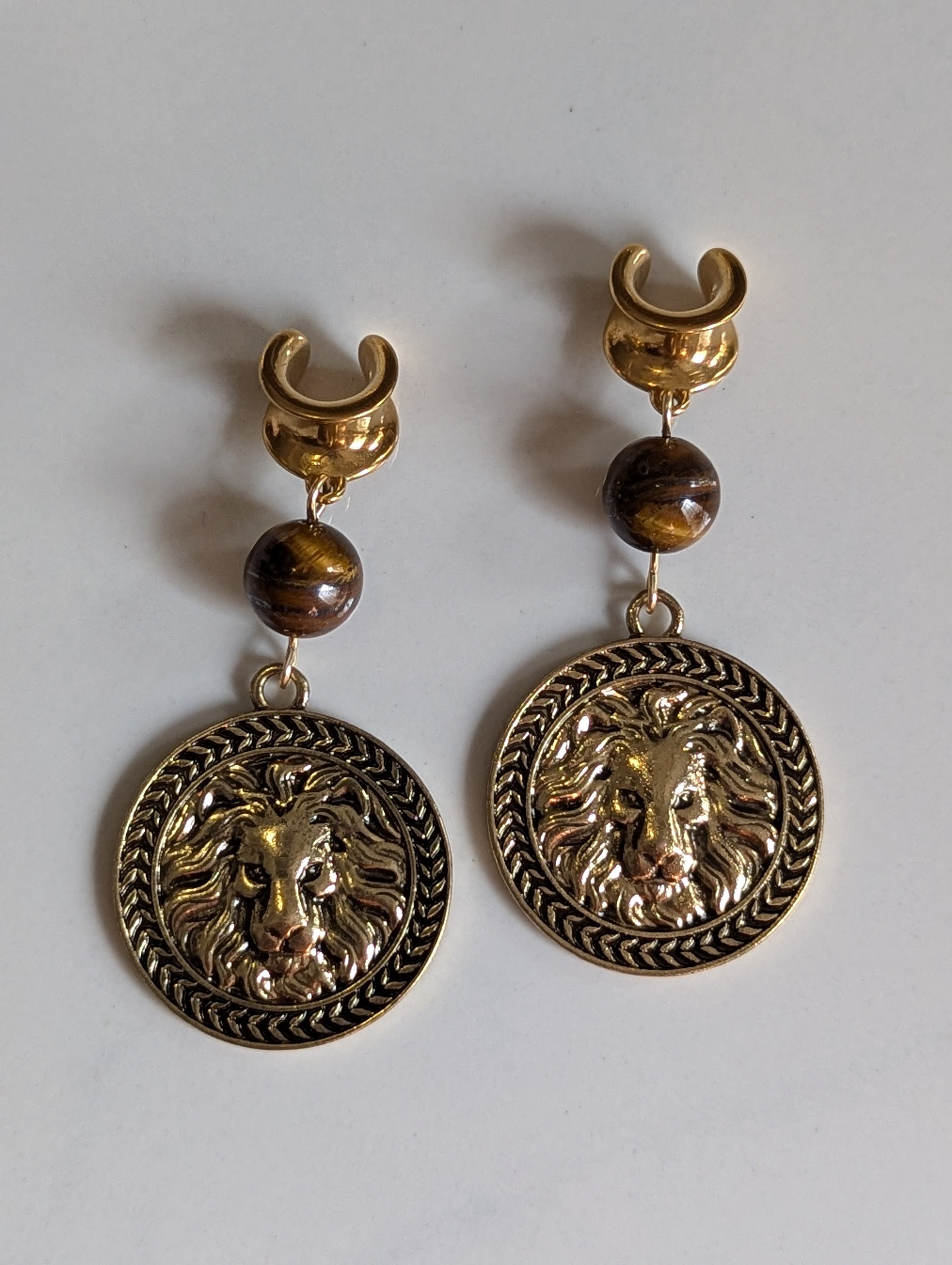 Lion Medallion saddle gauges