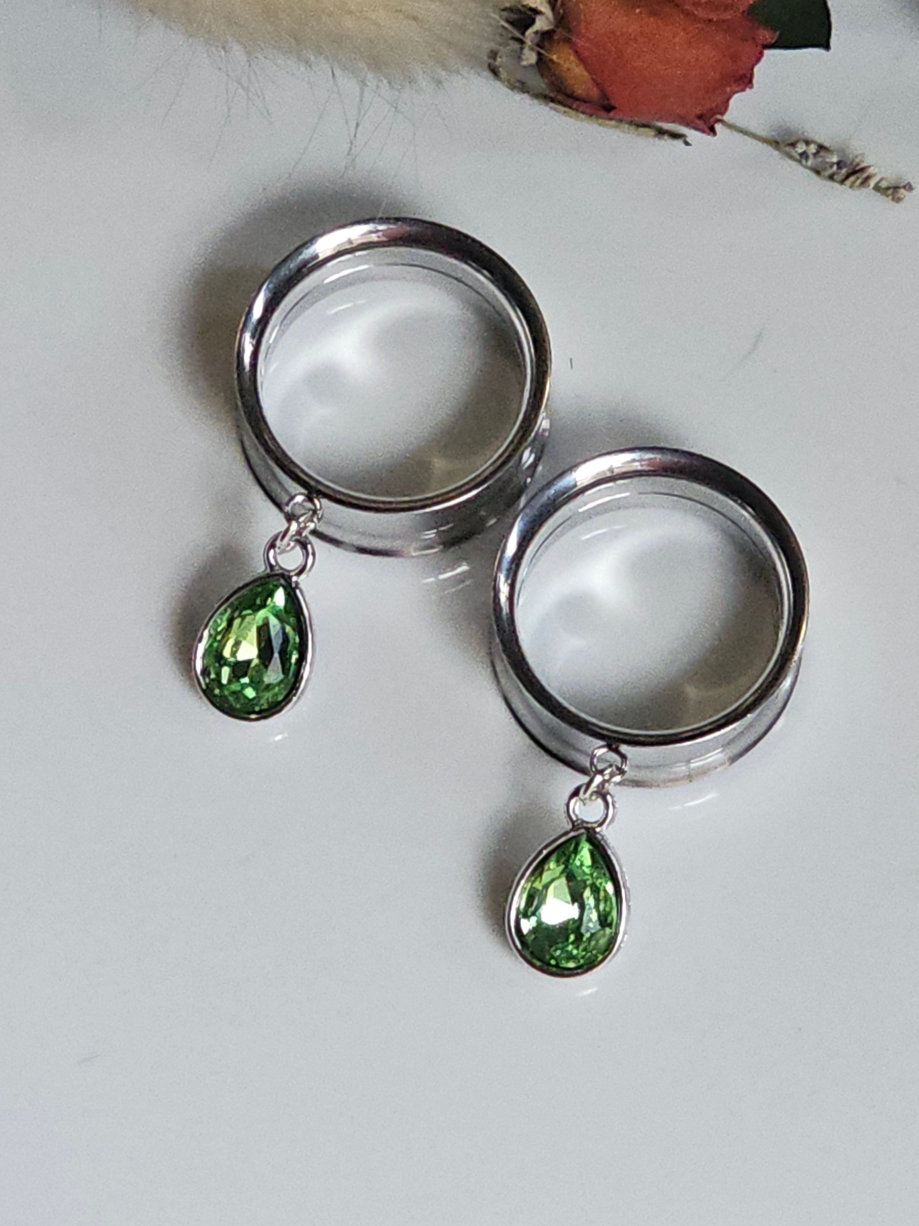 Small peridot dangle gauges
