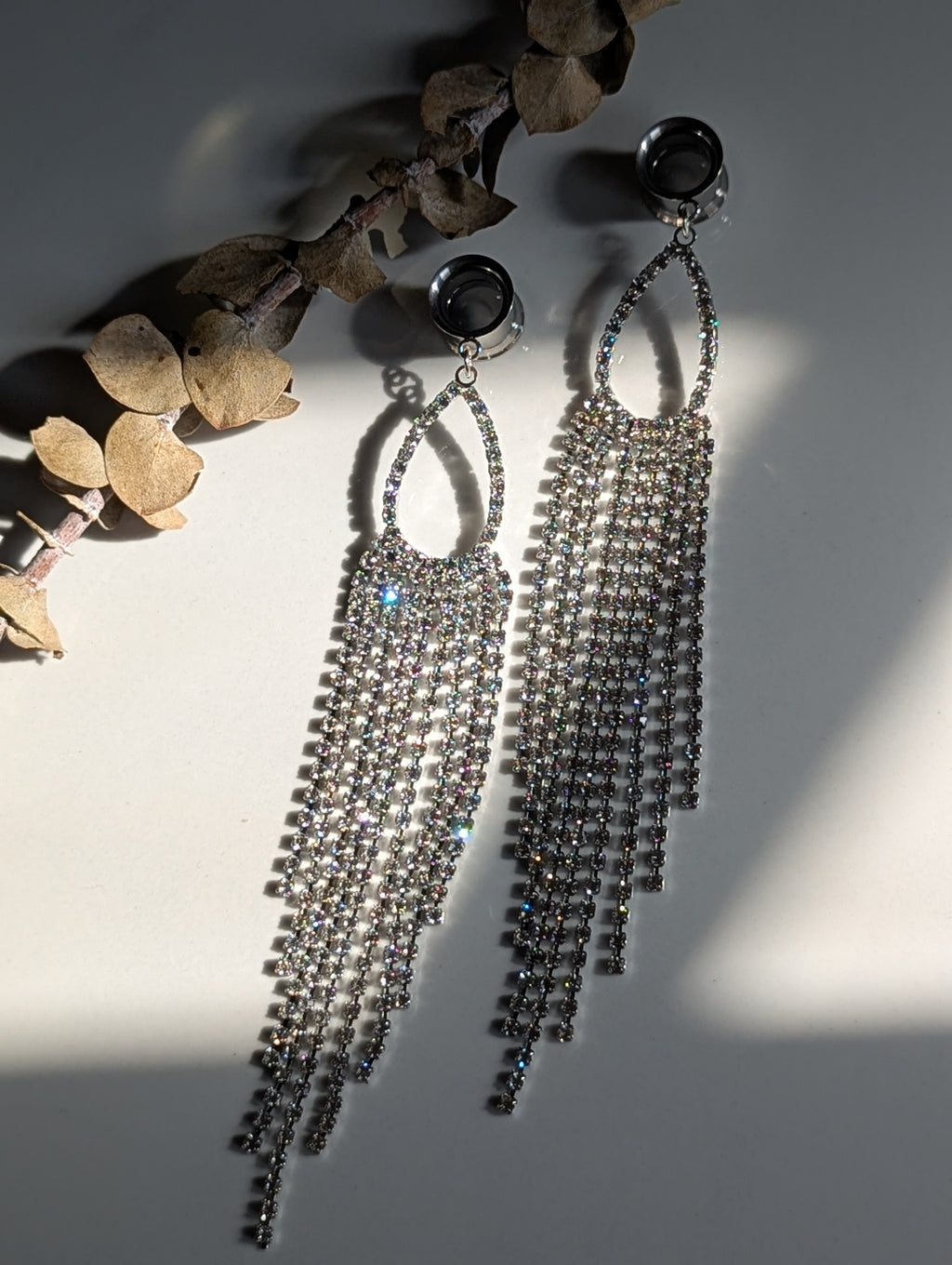 Diamond tassel dangle gauges
