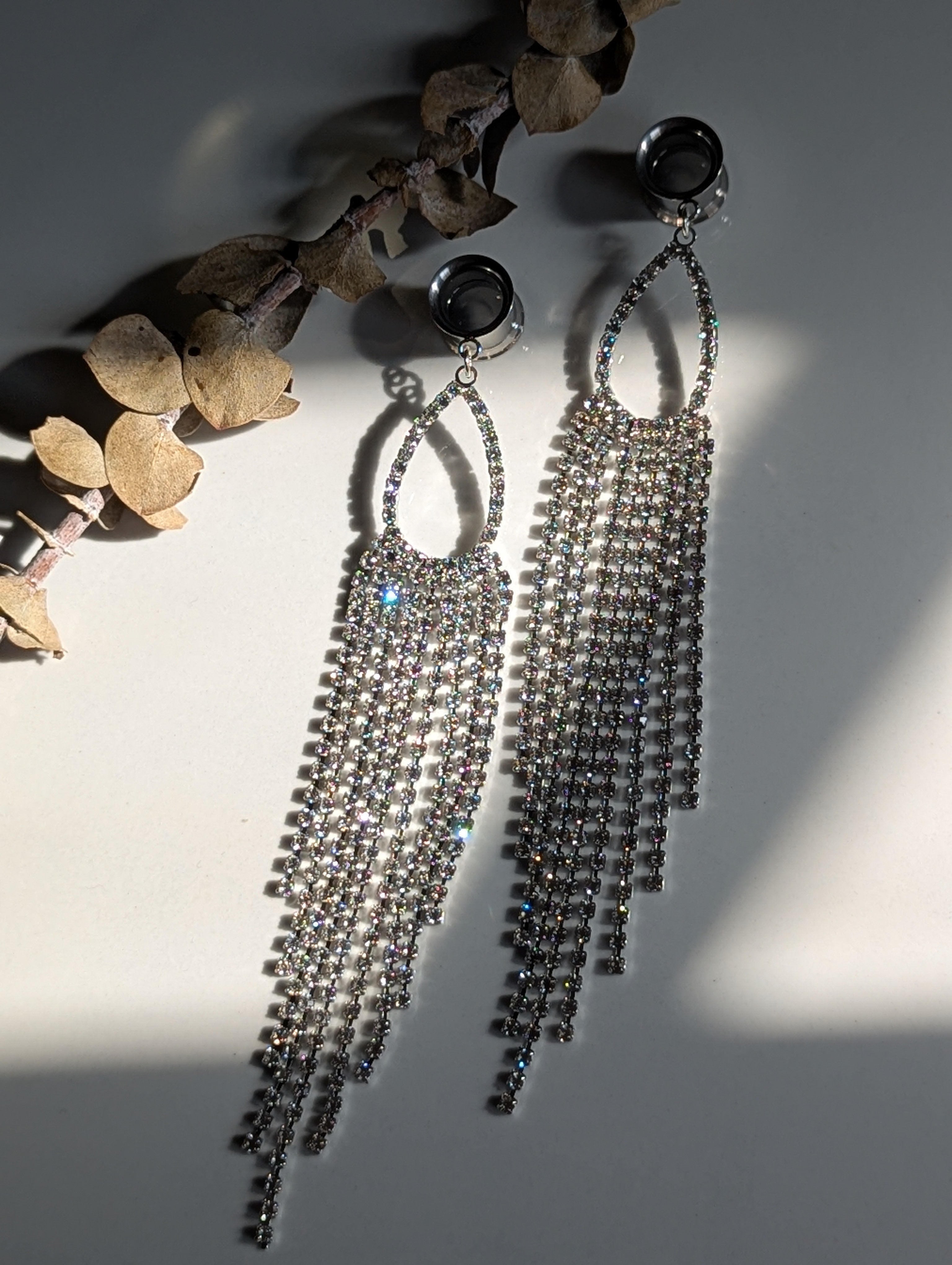 Diamond tassel dangle gauges