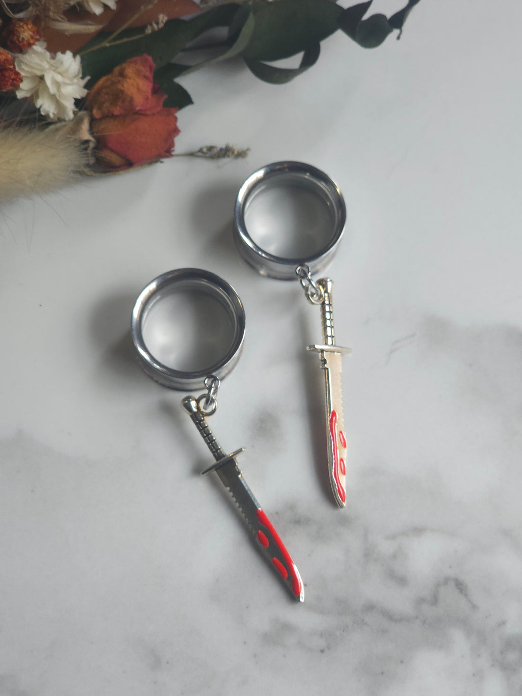 Bloody butcher knife dangle gauges