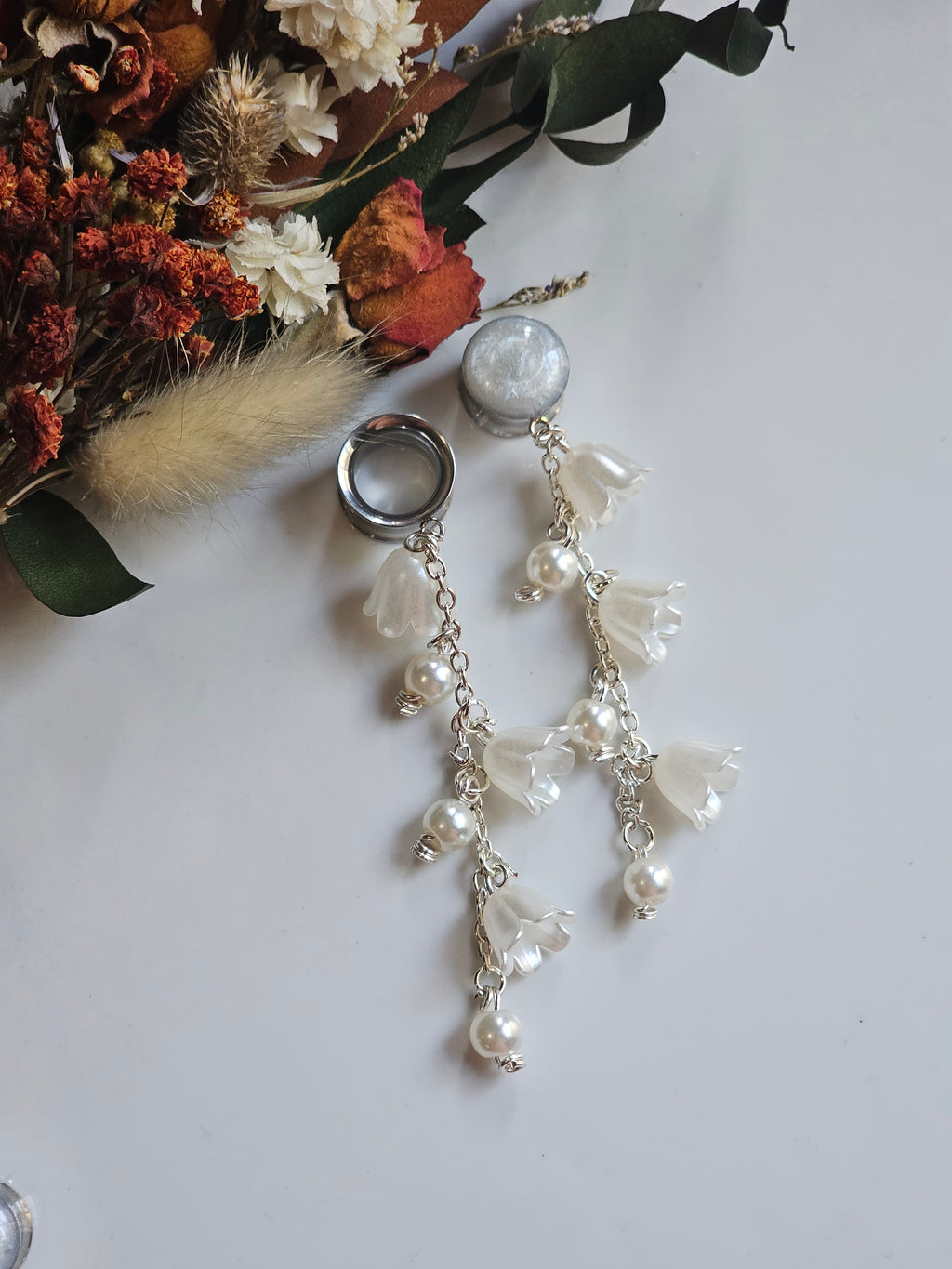 Pearl and lily of the Valley dangle gauges