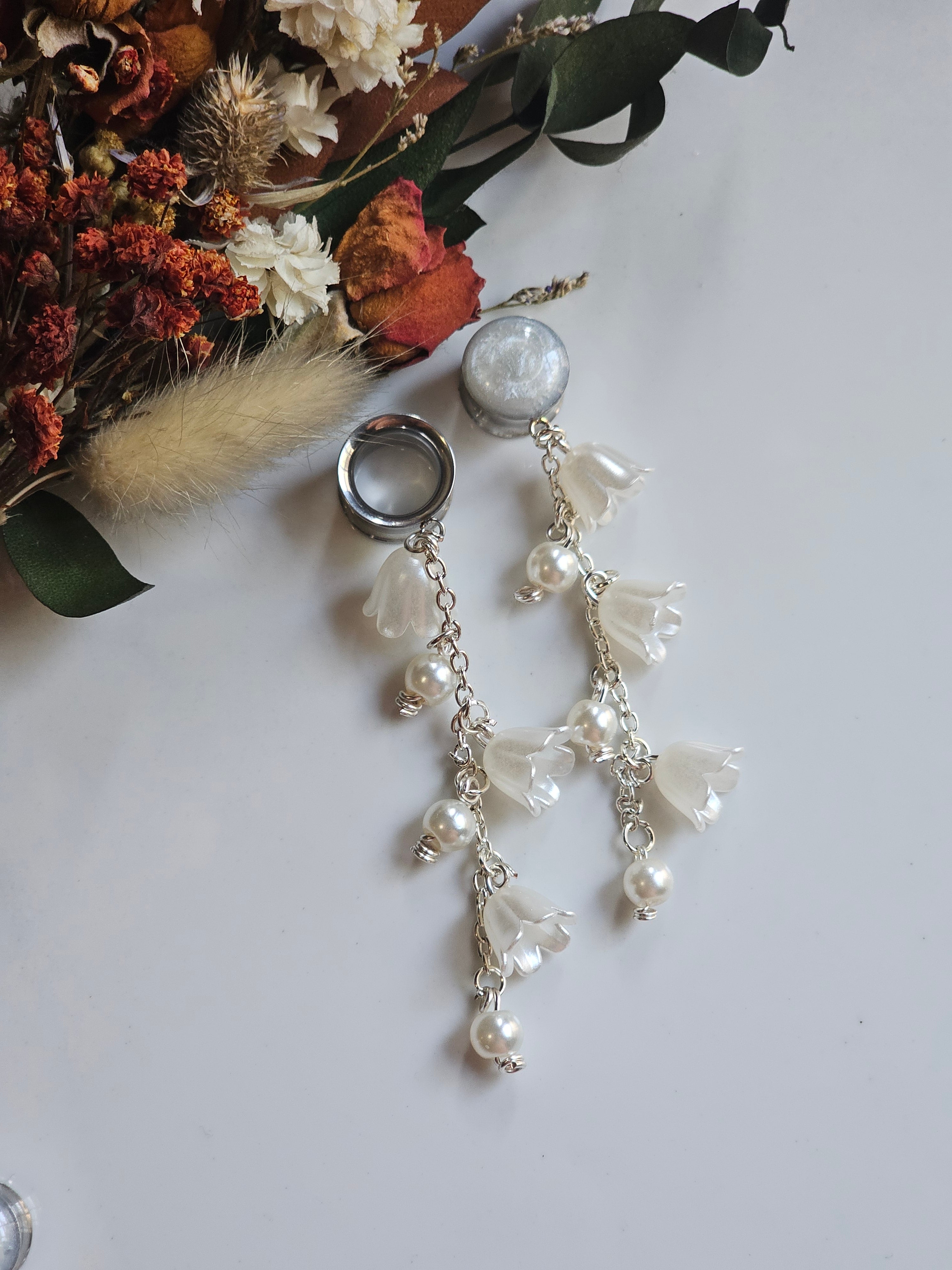 Pearl and lily of the Valley dangle gauges