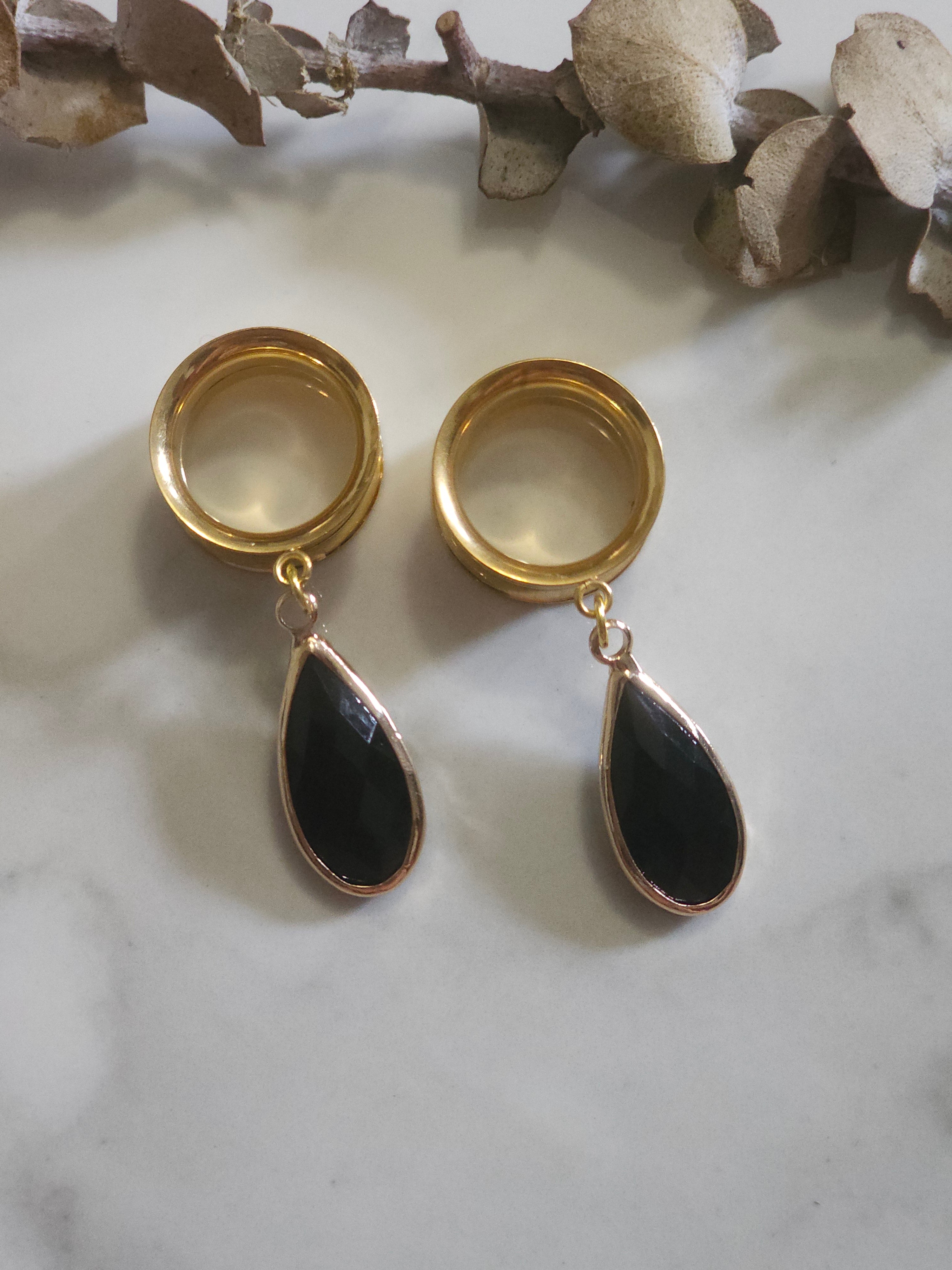 Black teardrop dangle gauges