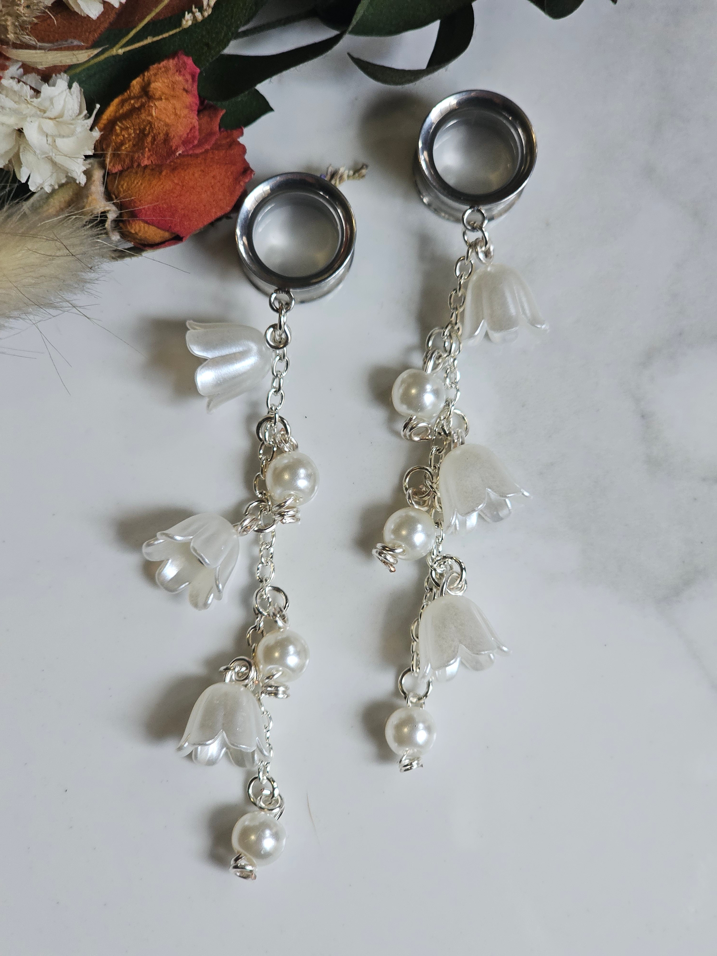 Pearl and lily of the Valley dangle gauges