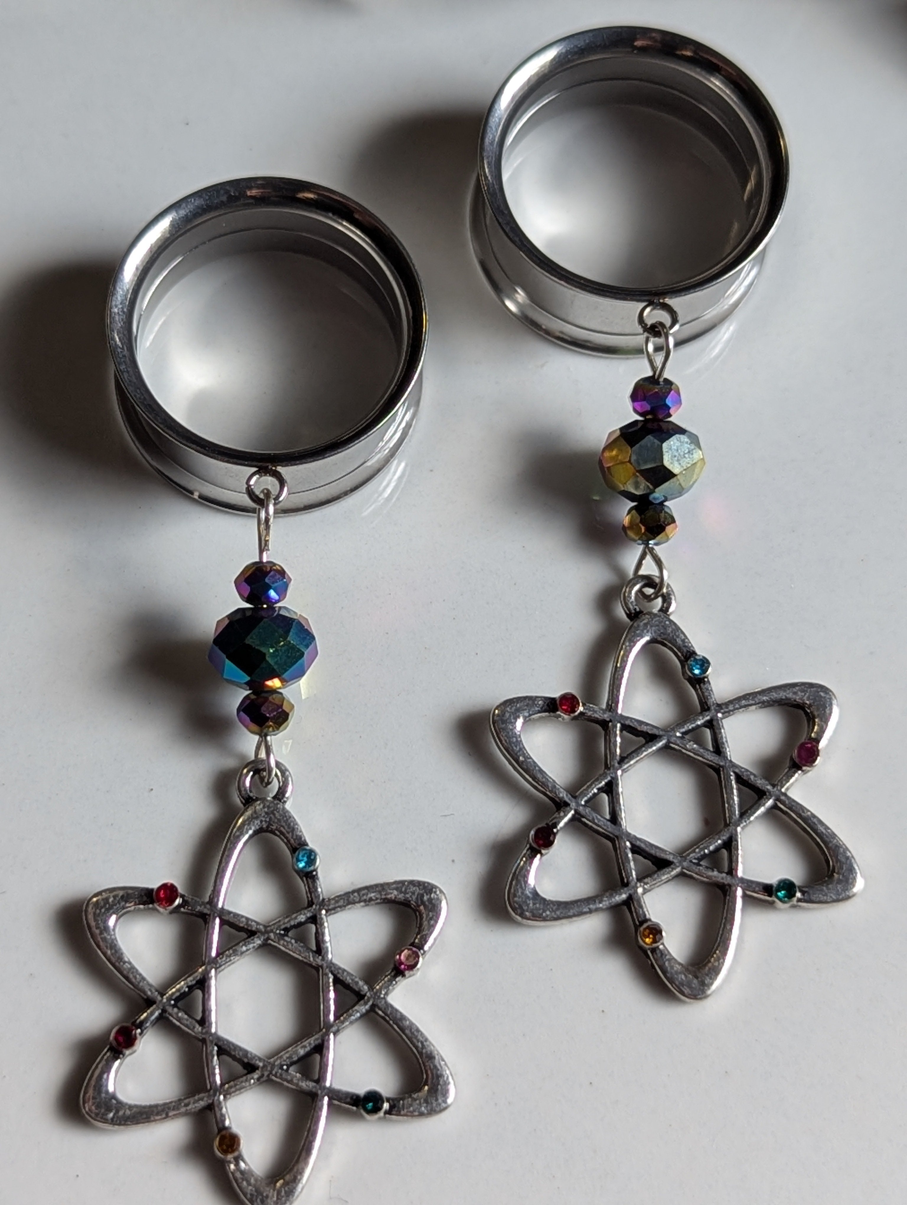 Atomic dangle gauges