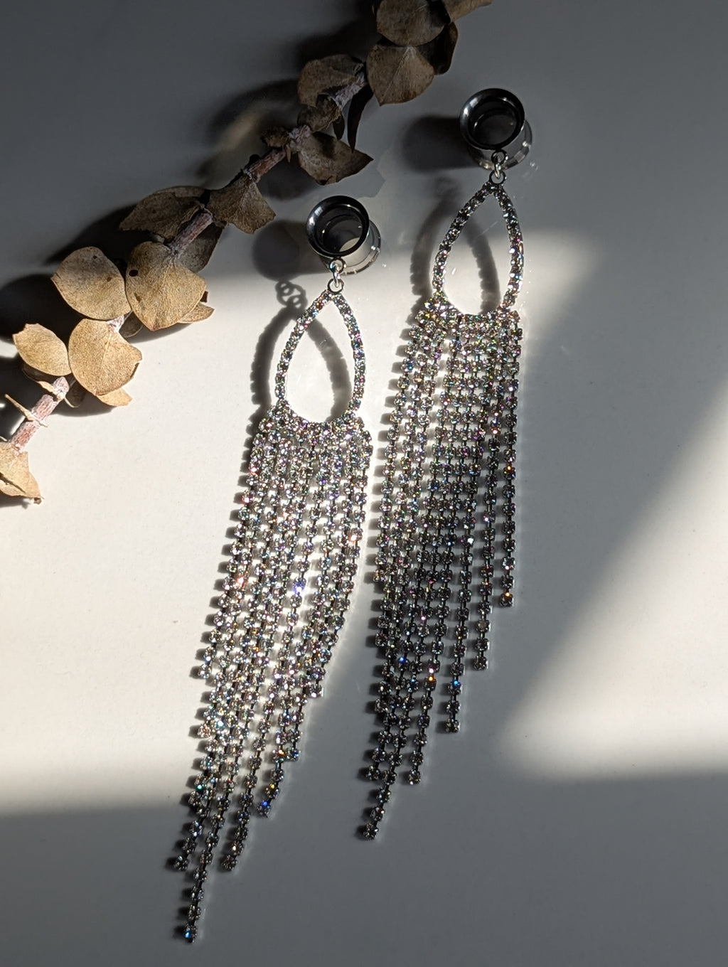 Diamond tassel dangle gauges
