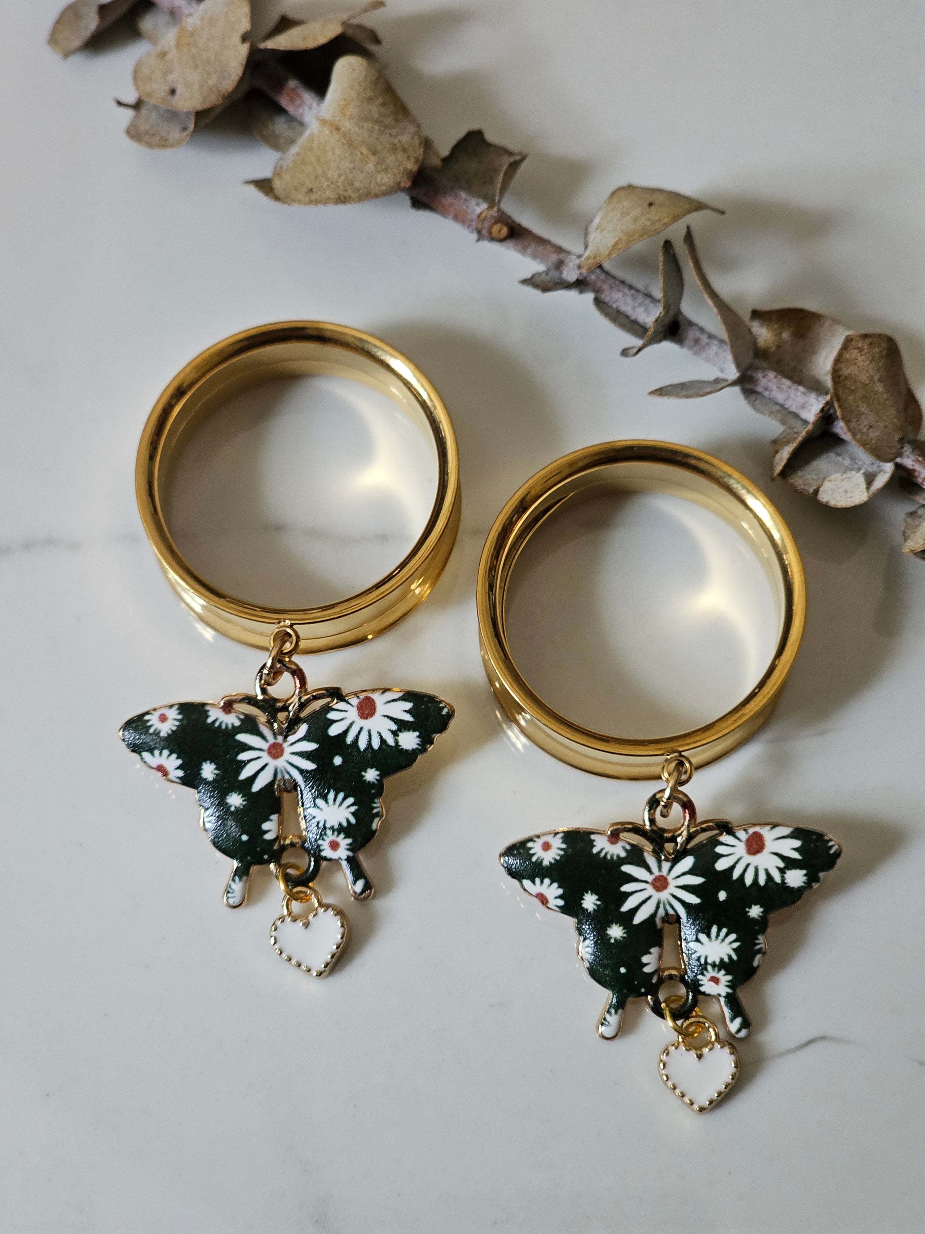 Floral butterfly dangle gauges