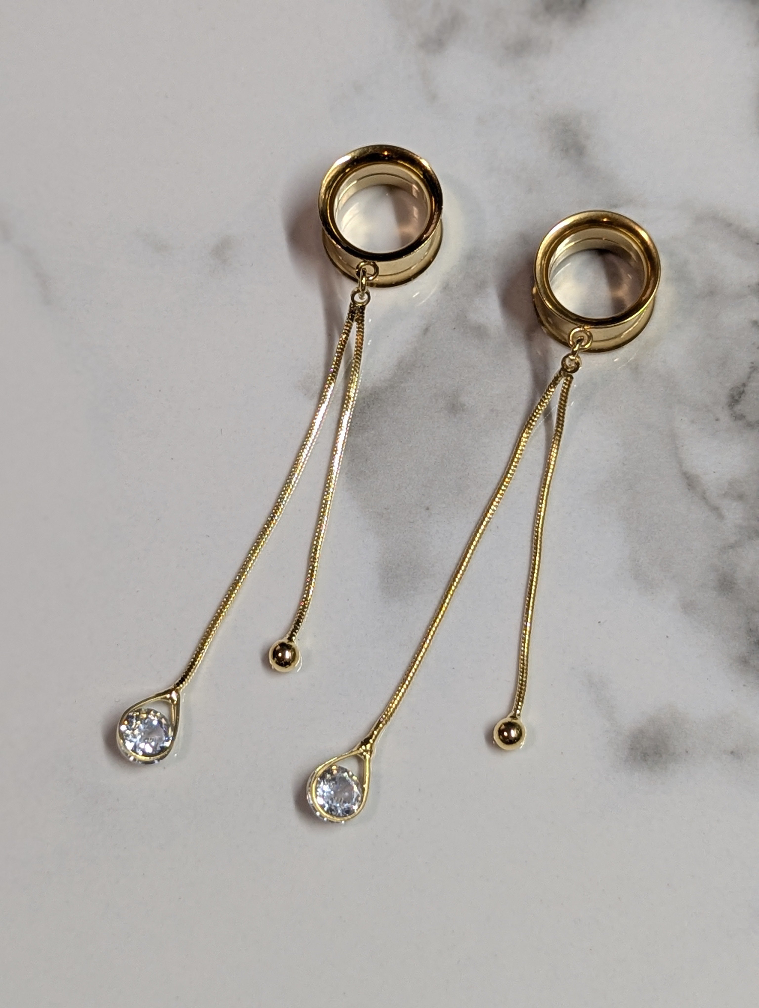 Dainty tassel gold tone dangle gauges