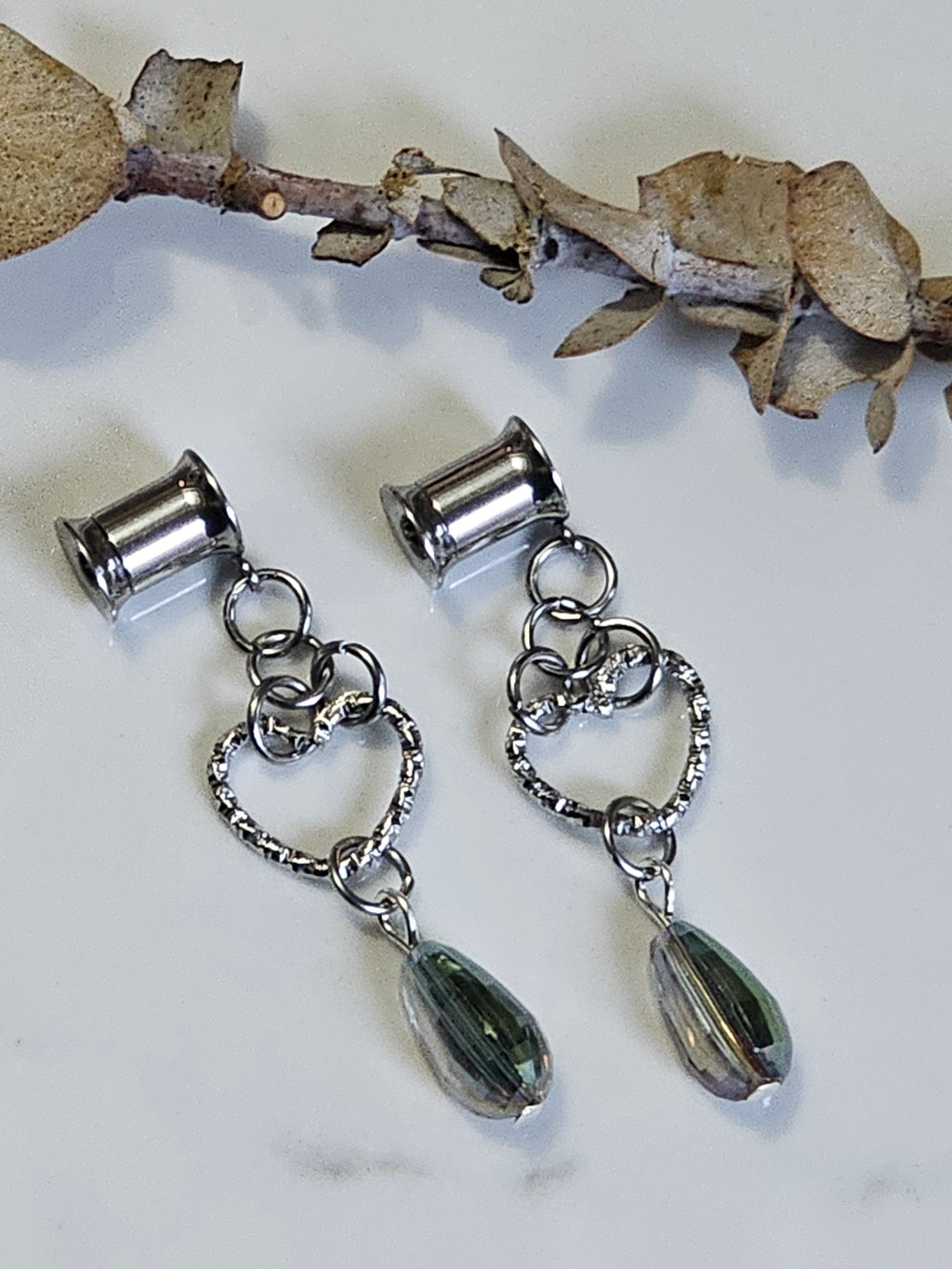 Moving heart dangle gauges