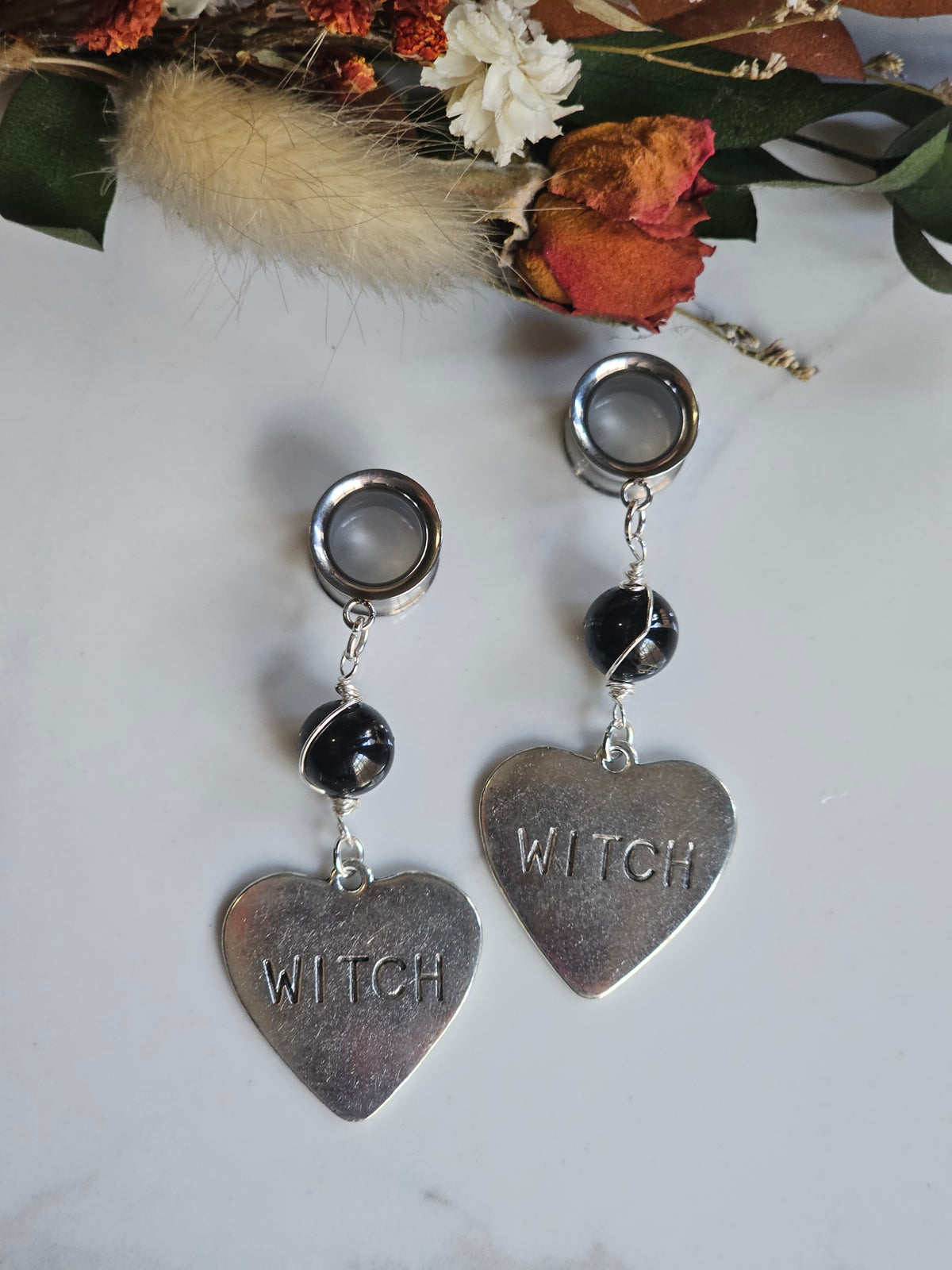 Witch dangle plugs