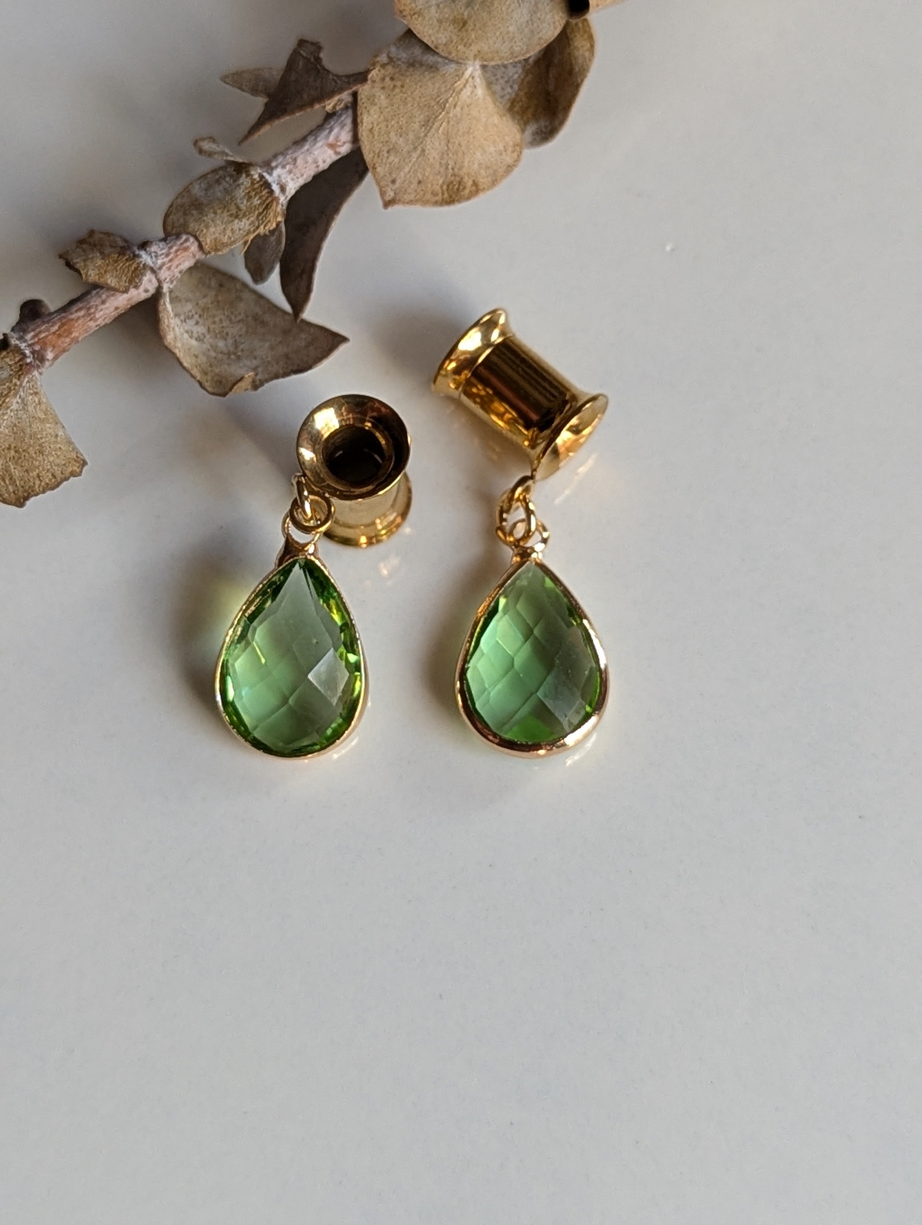 Peridot dangle gauges