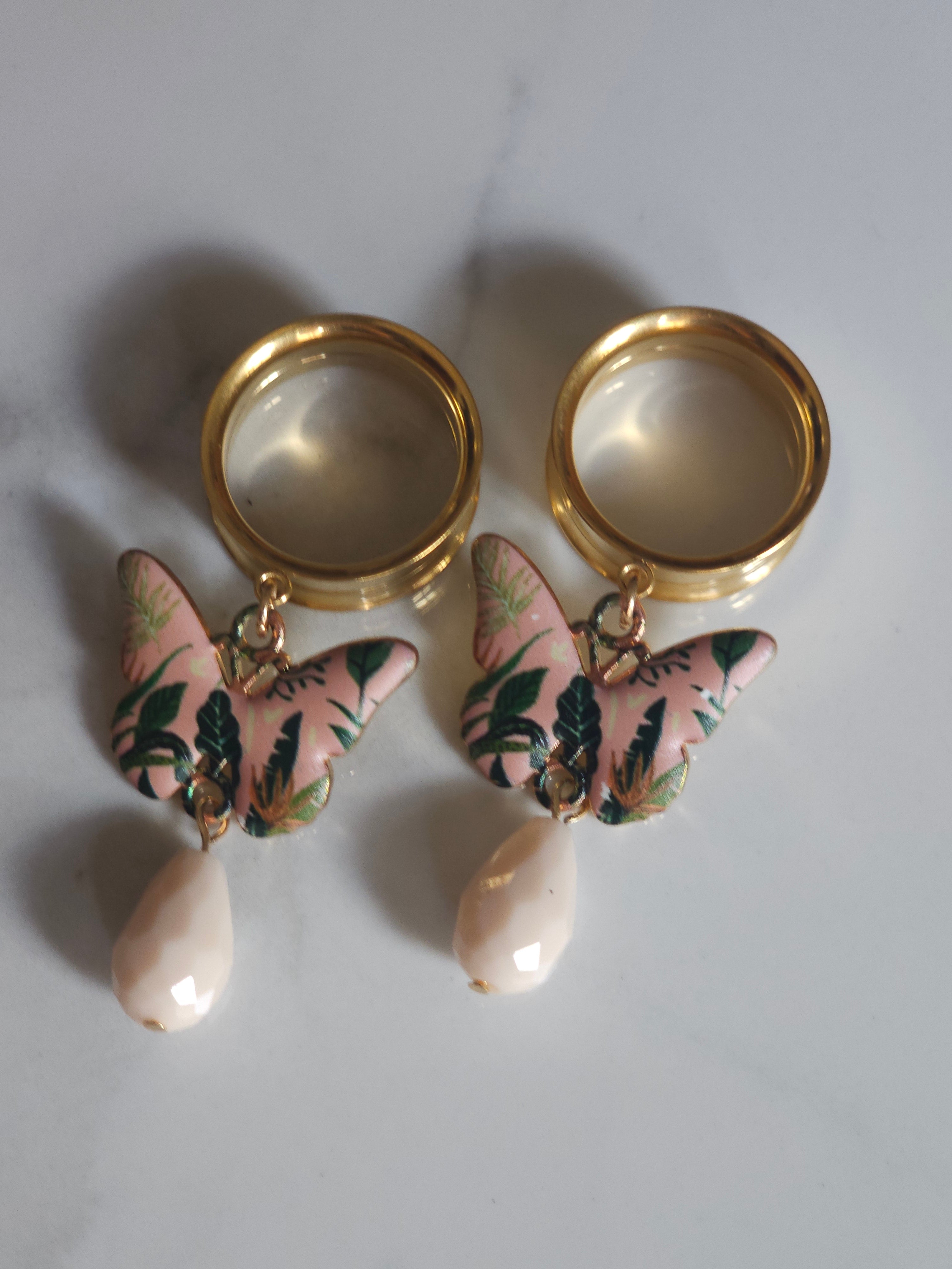 Pink butterfly dangle gauges