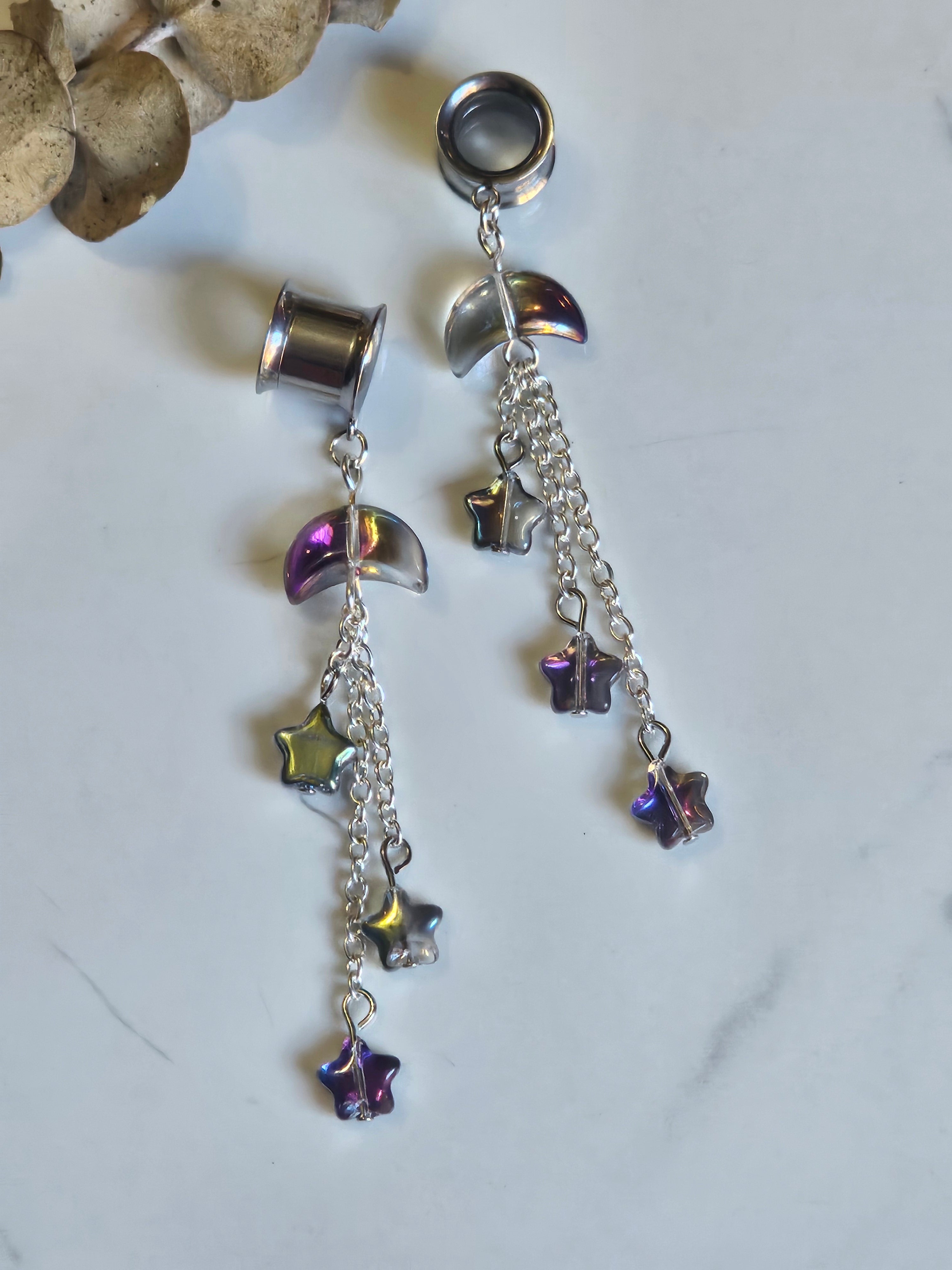 Celestial sky dangle gauges