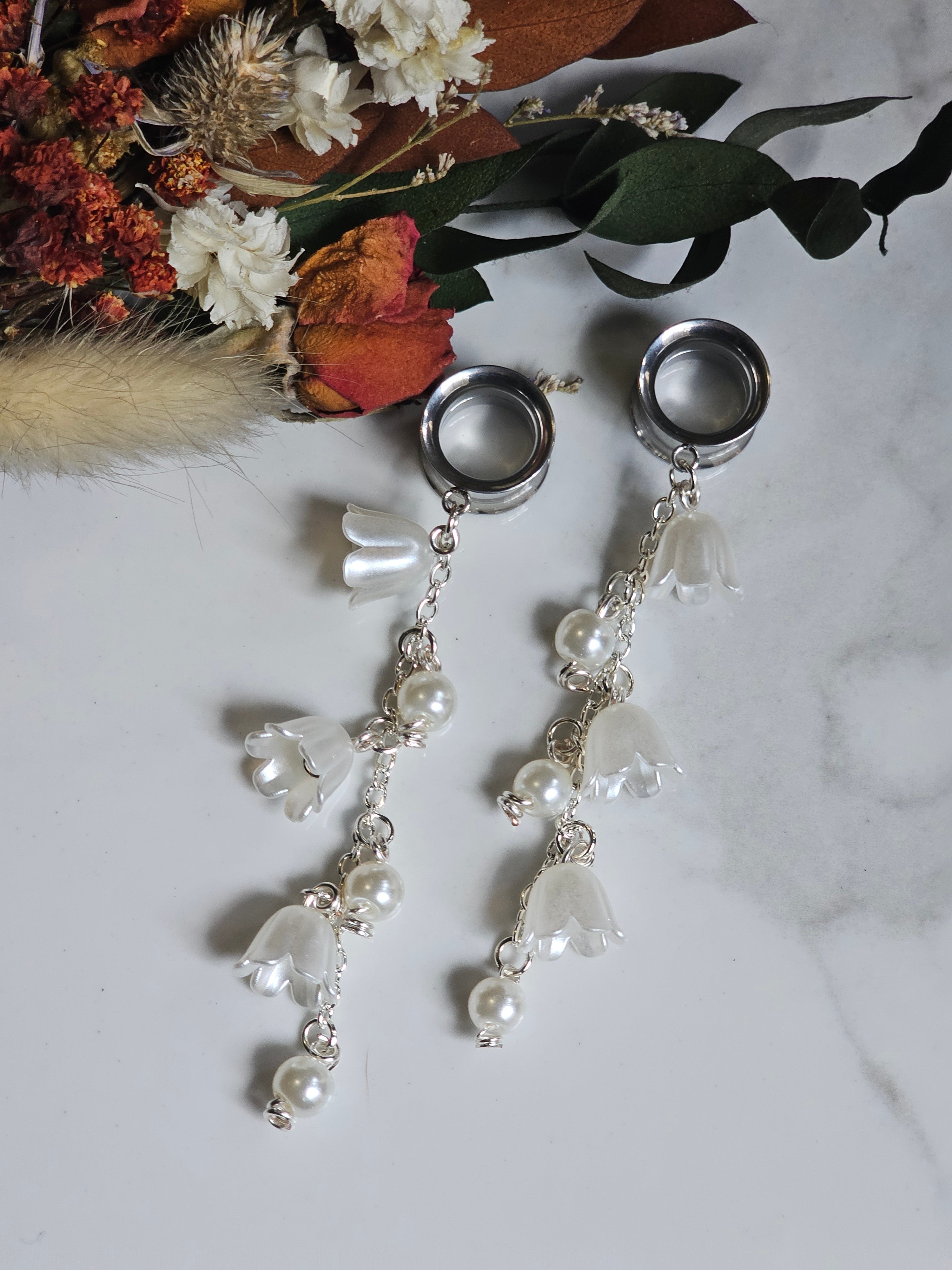 Pearl and lily of the Valley dangle gauges