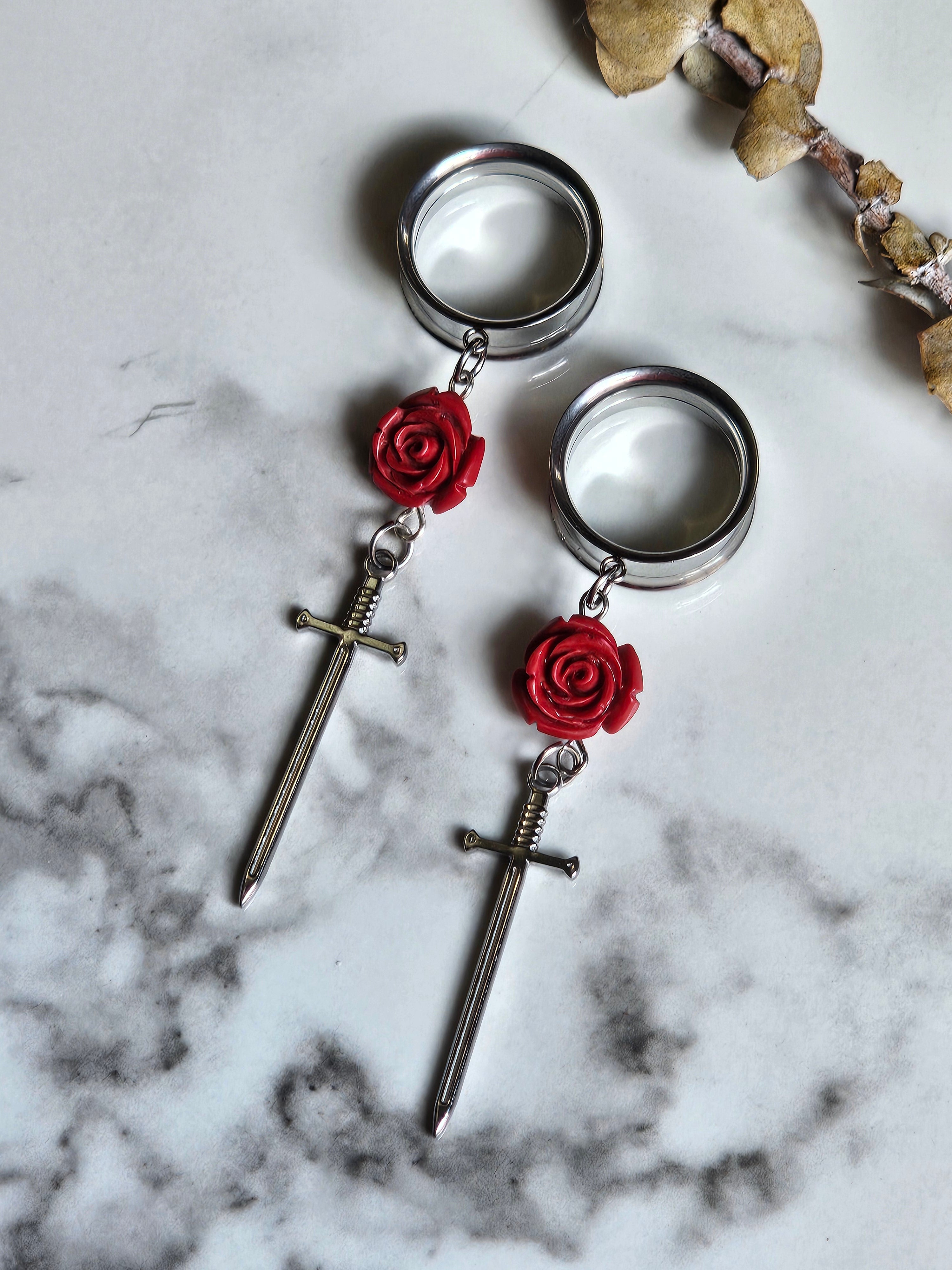 Rose sword dangle gauges