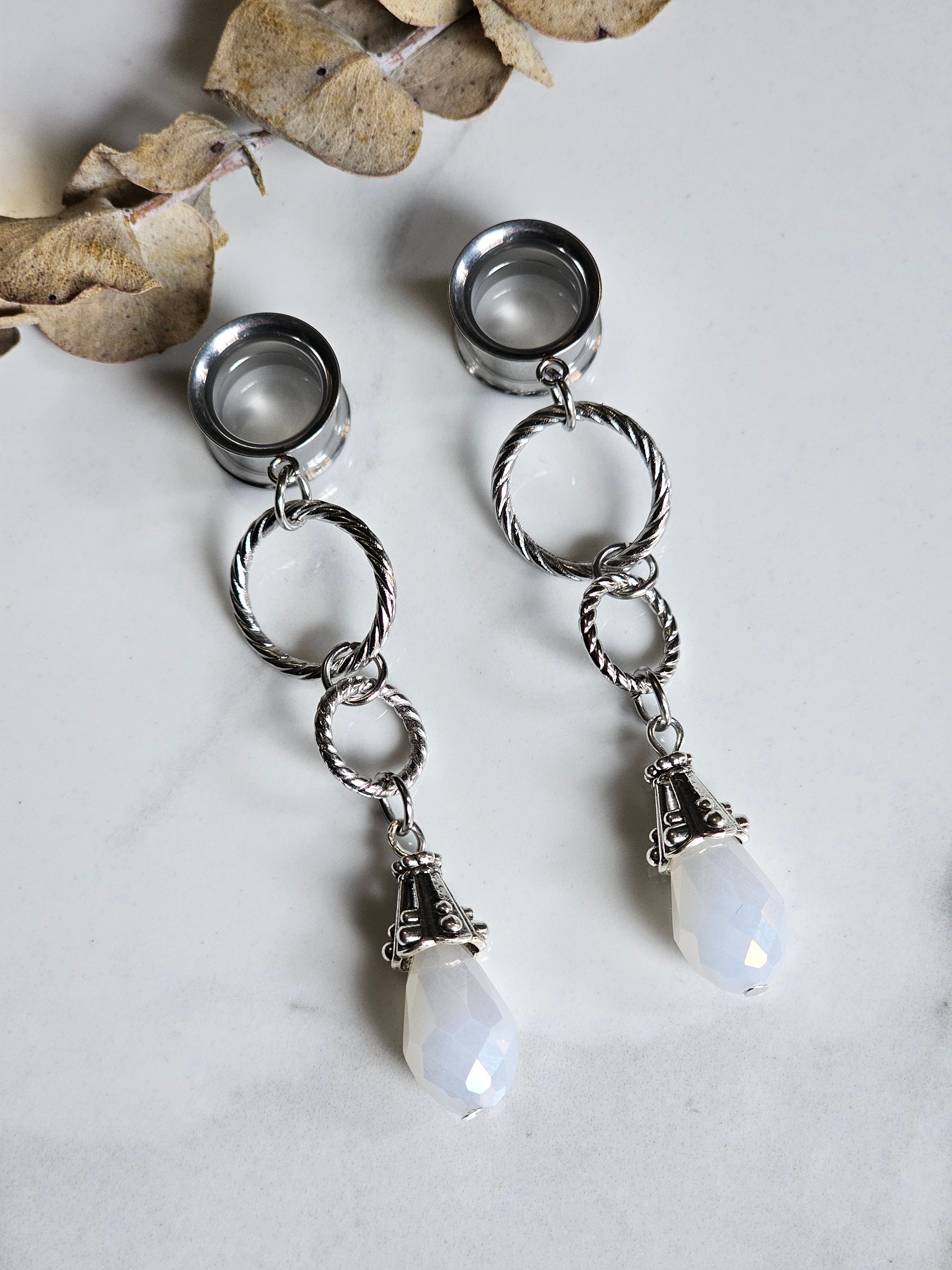 White drop dangle gauges