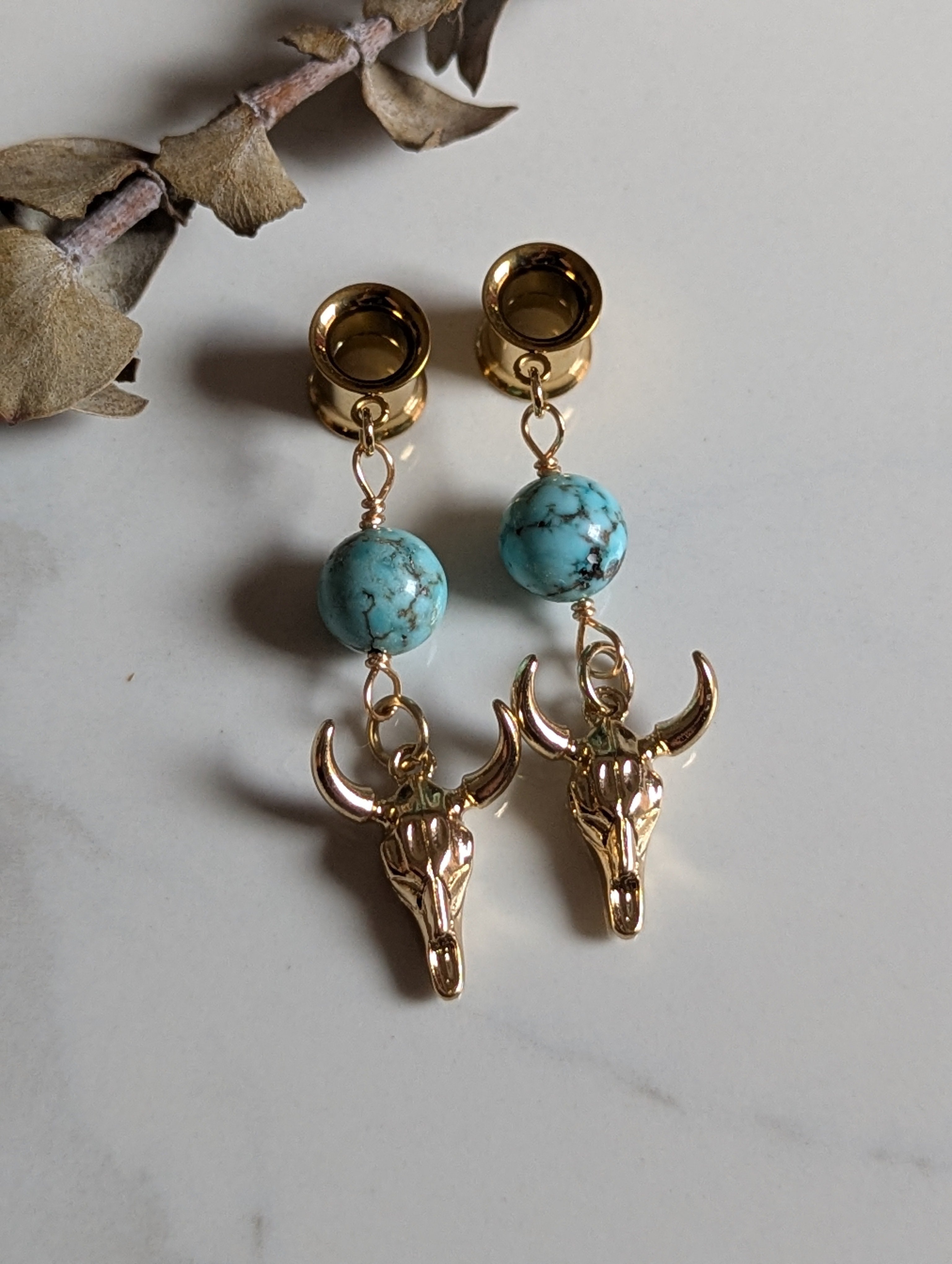 Western cow skull dangle gauges