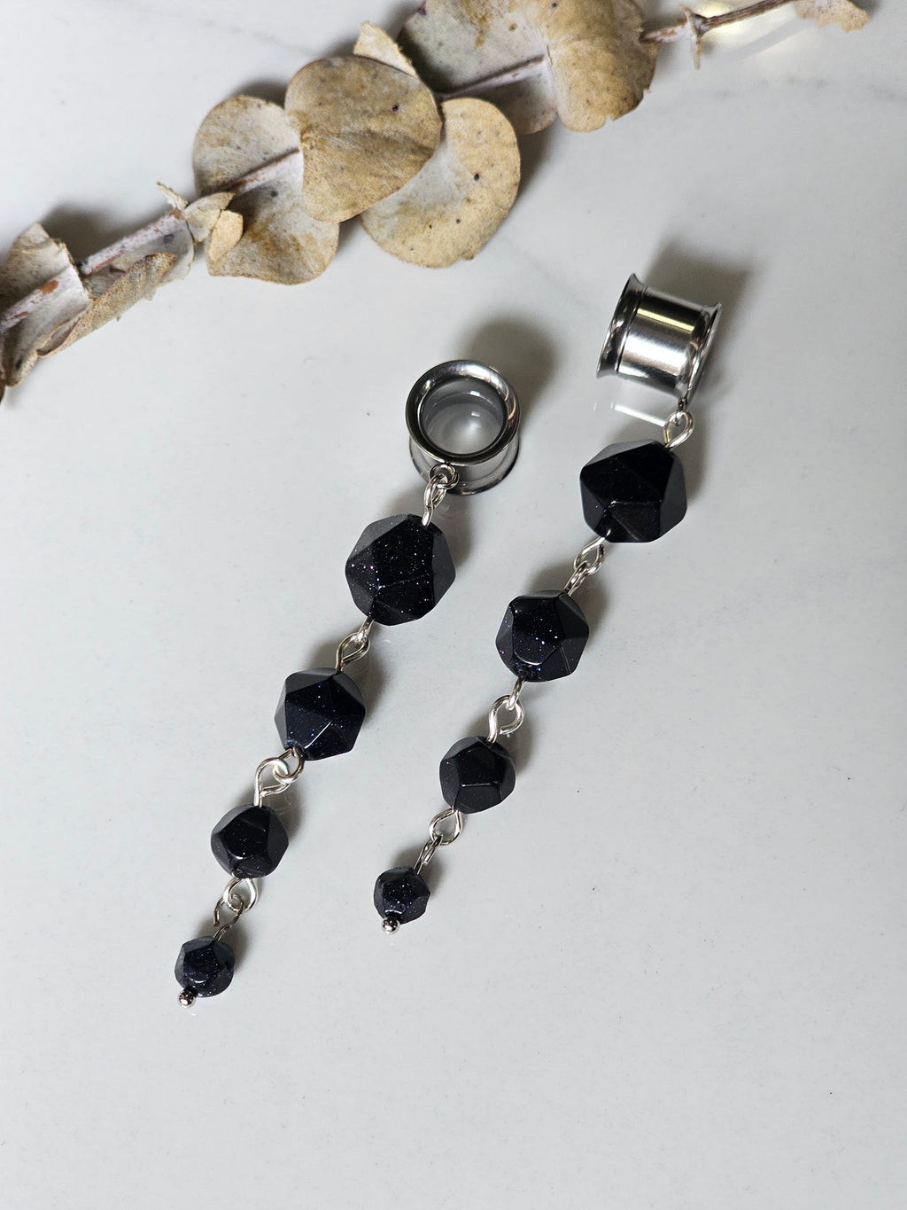 Blue sandstone dangle gauges
