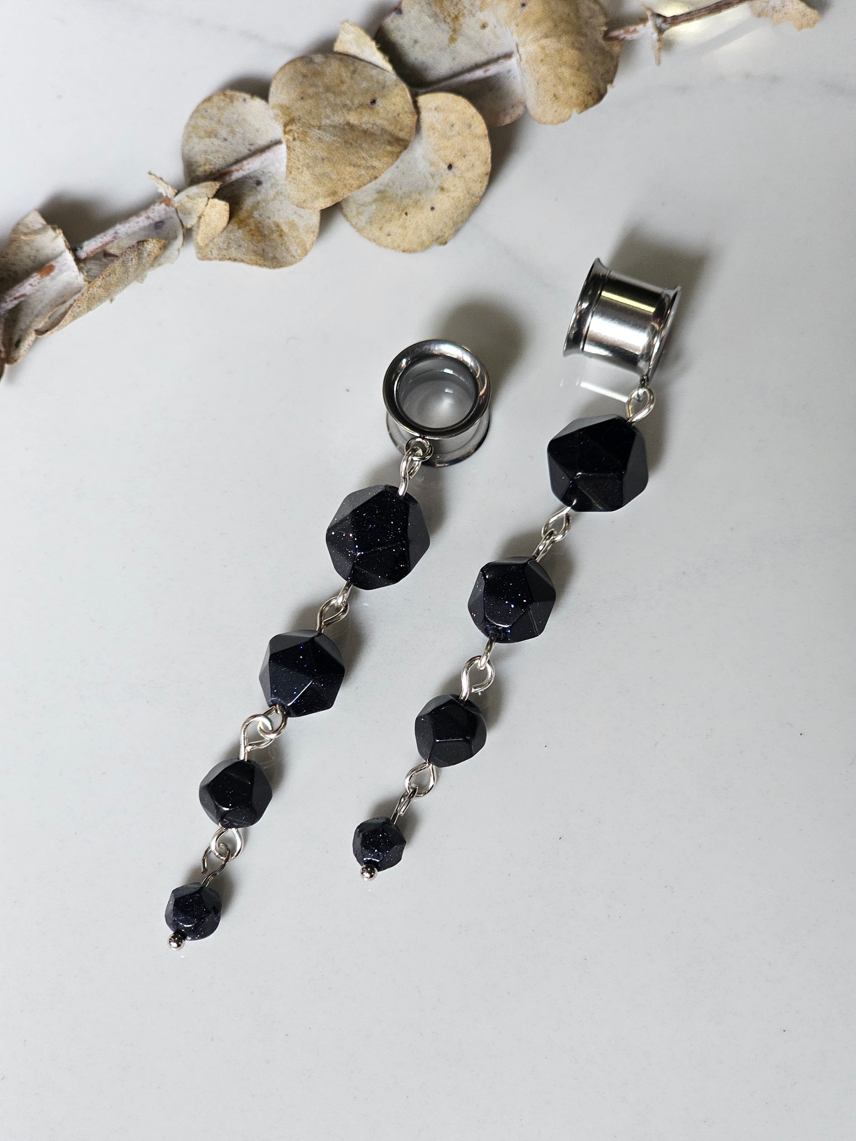 Blue sandstone dangle gauges