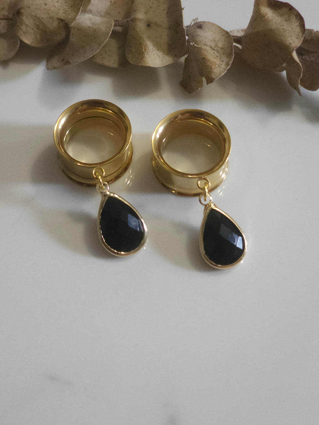 Black glass dangle gauges