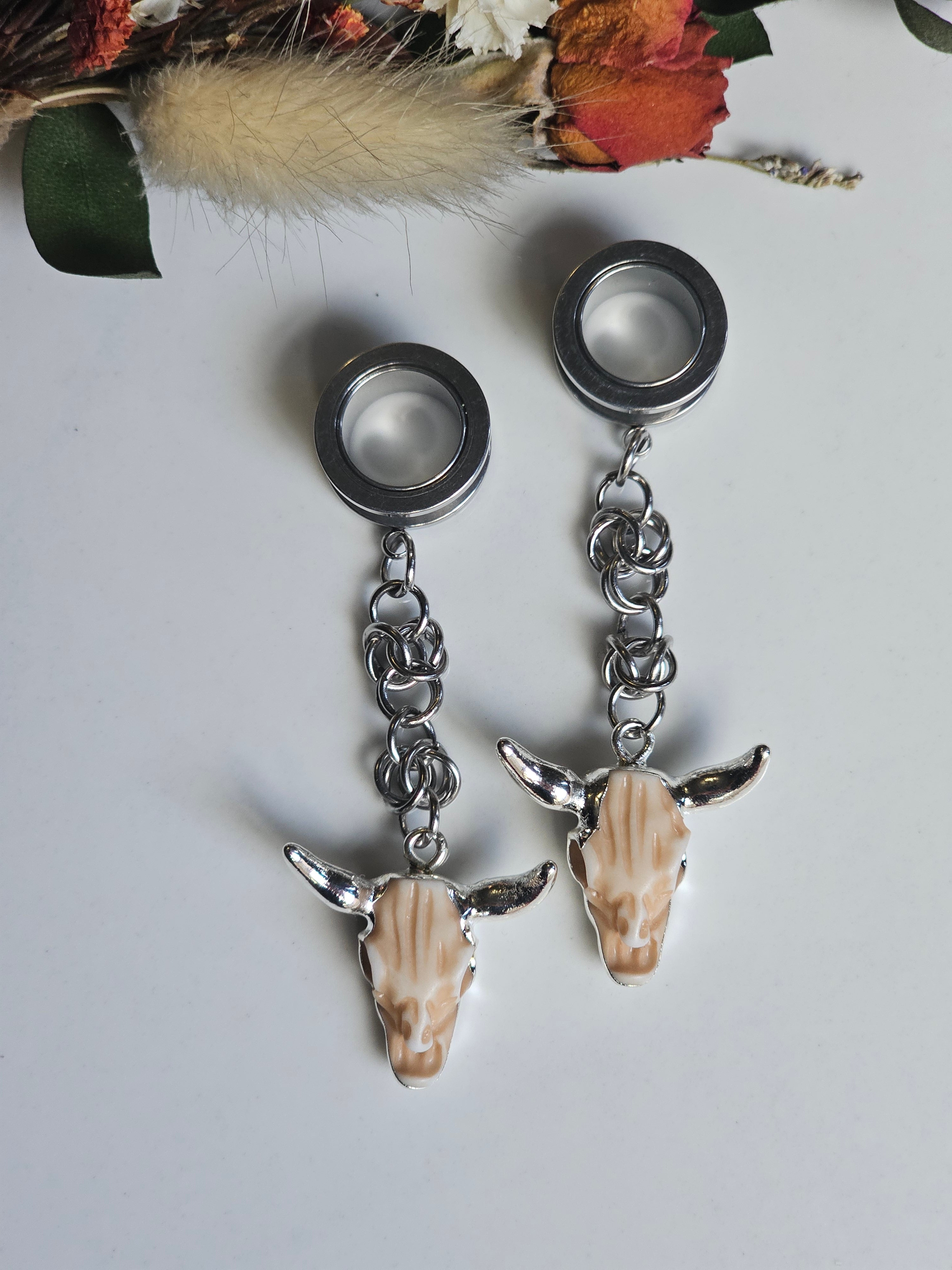 Bull skull dangle gauges