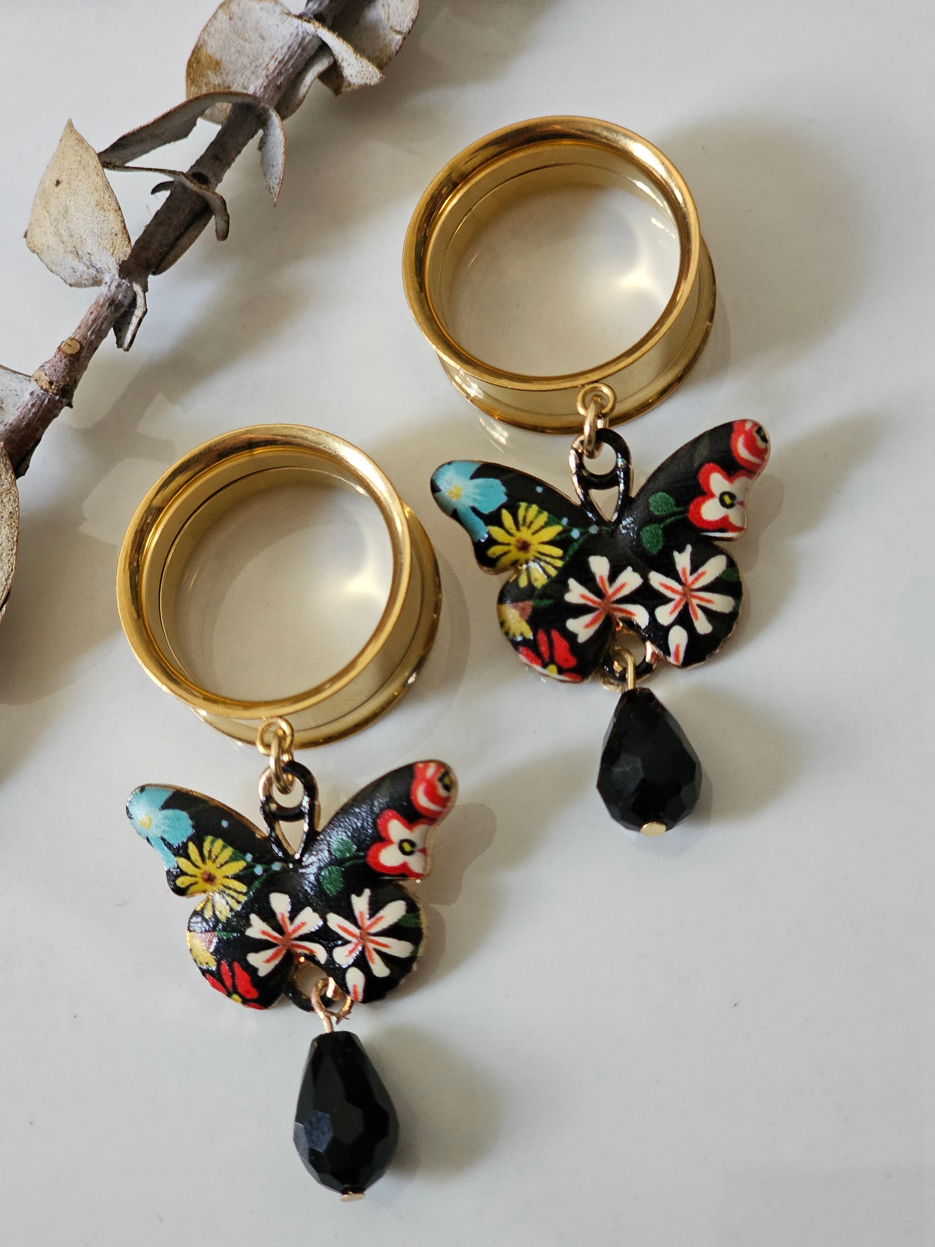 Black butterfly dangle gauges