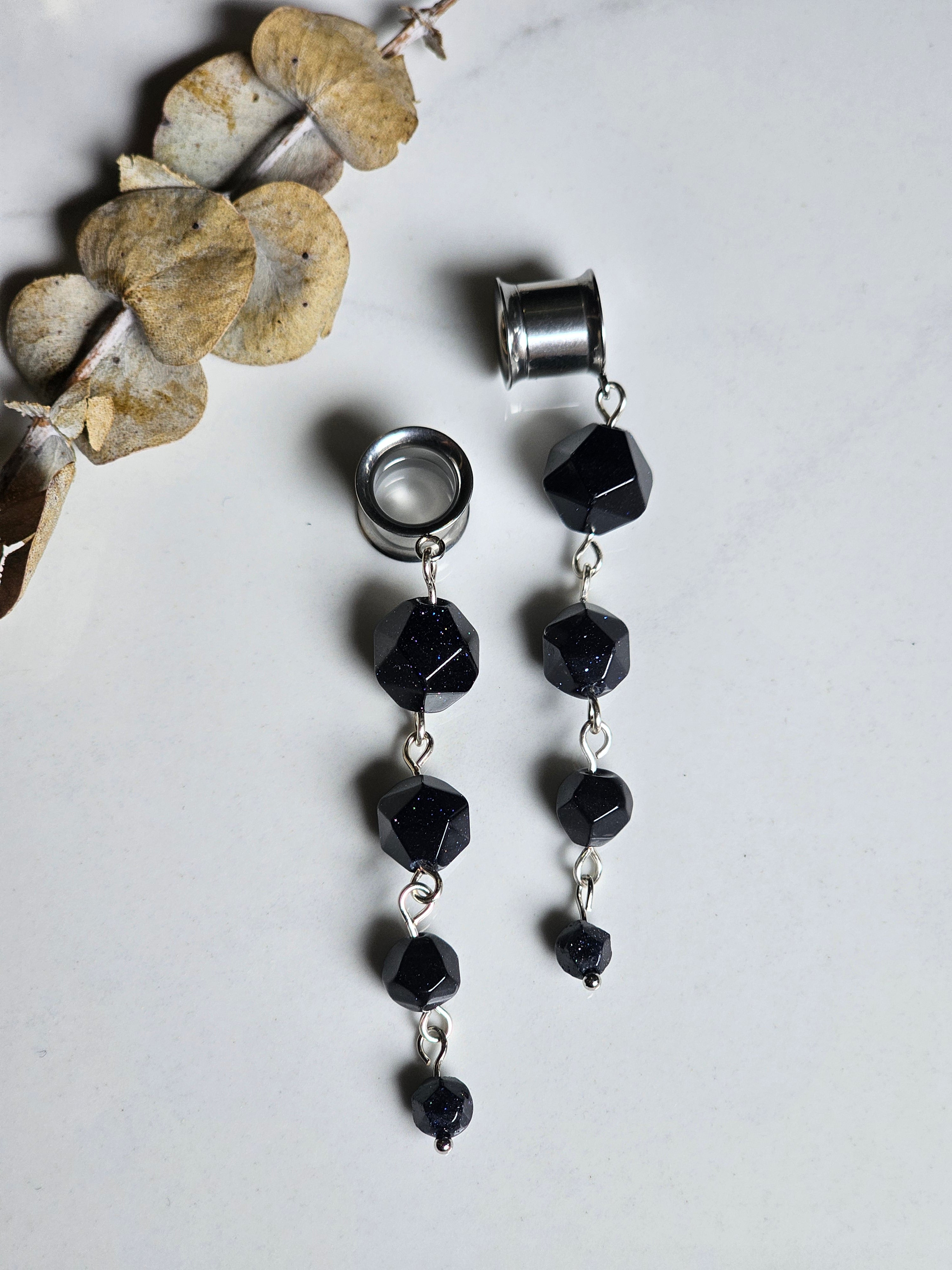 Blue sandstone dangle gauges
