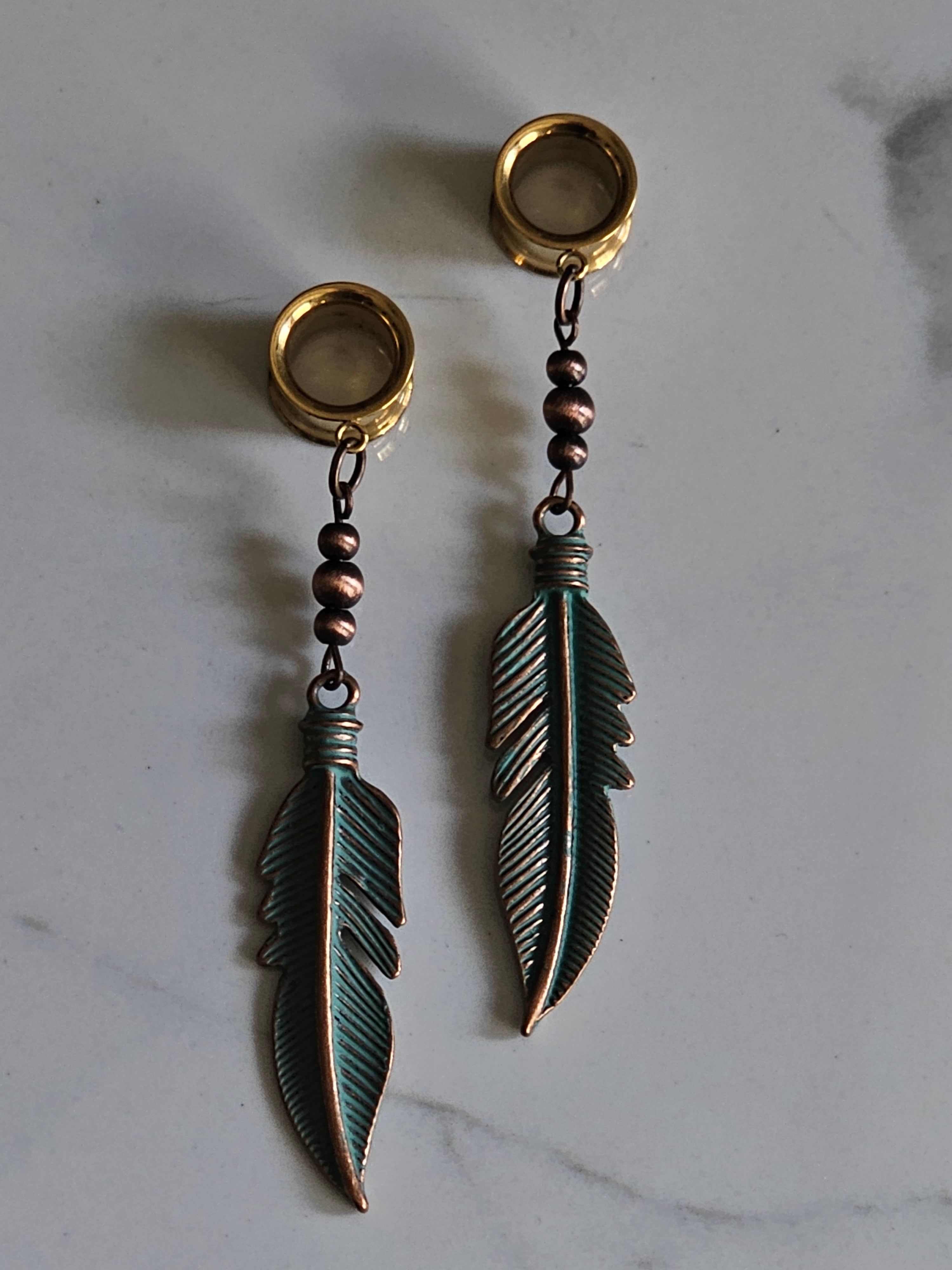 Antique style feather dangle gauges