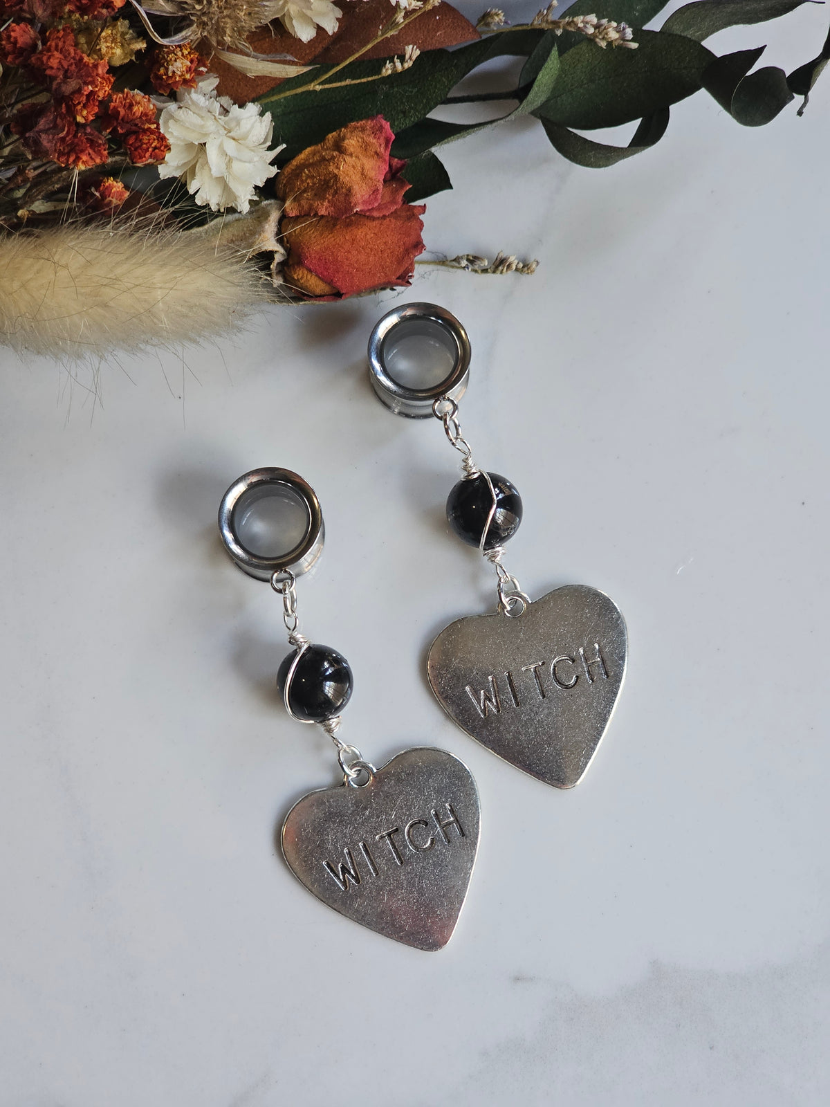 Witch dangle plugs