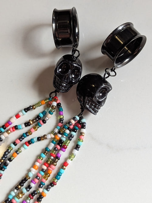 Beaded Skull tasseled dangle gauges