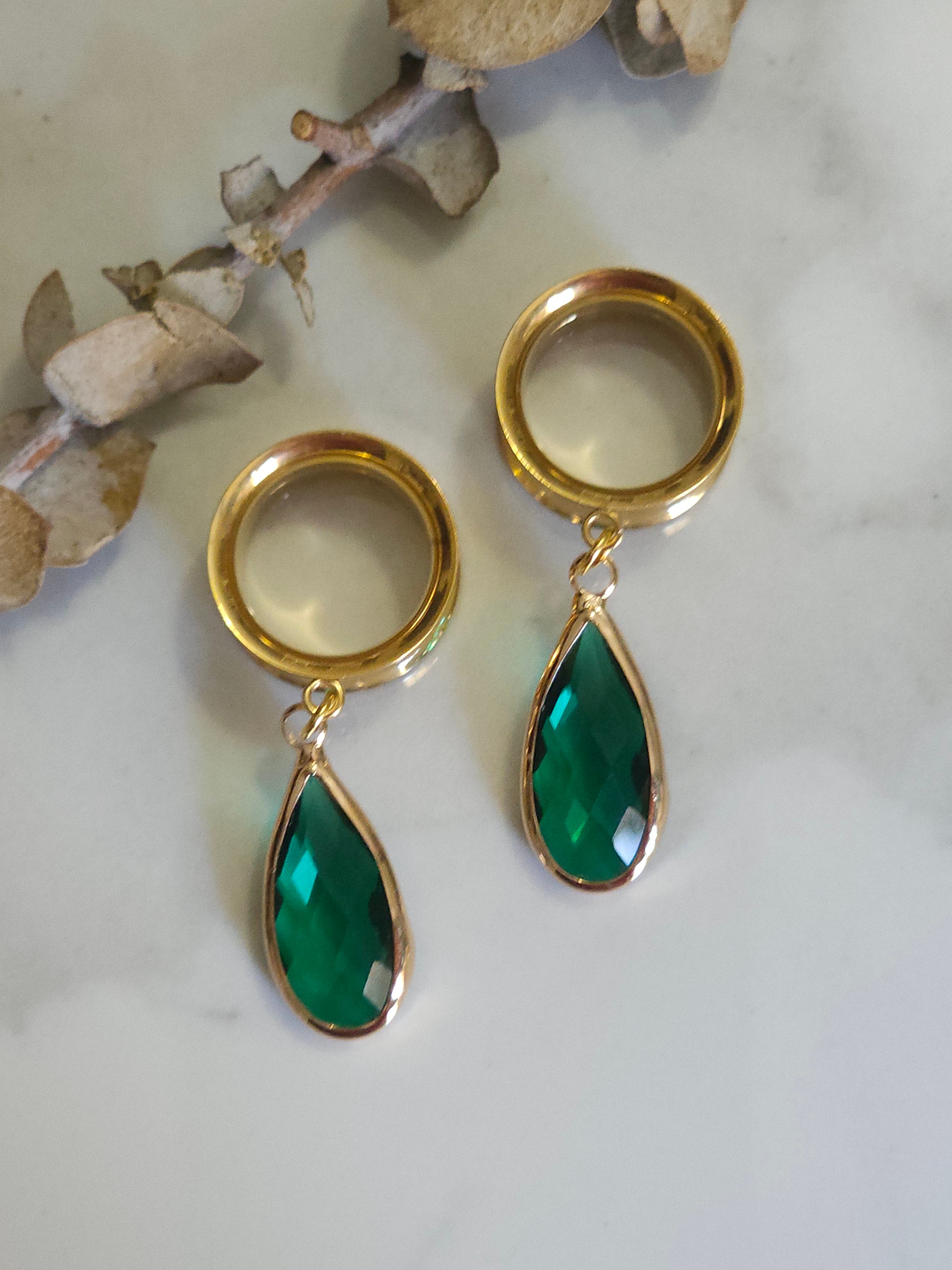Emerald dangle gauges