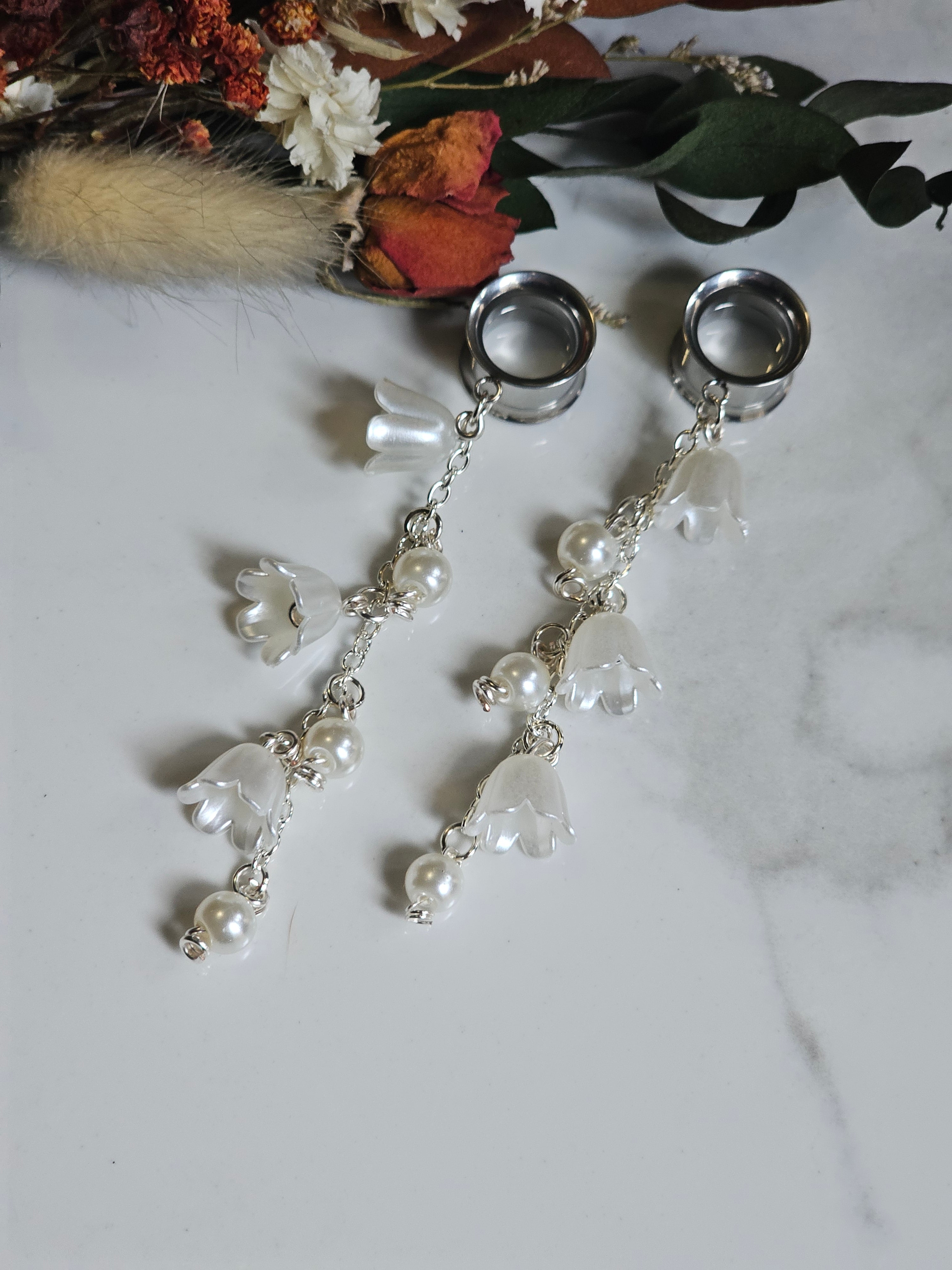 Pearl and lily of the Valley dangle gauges
