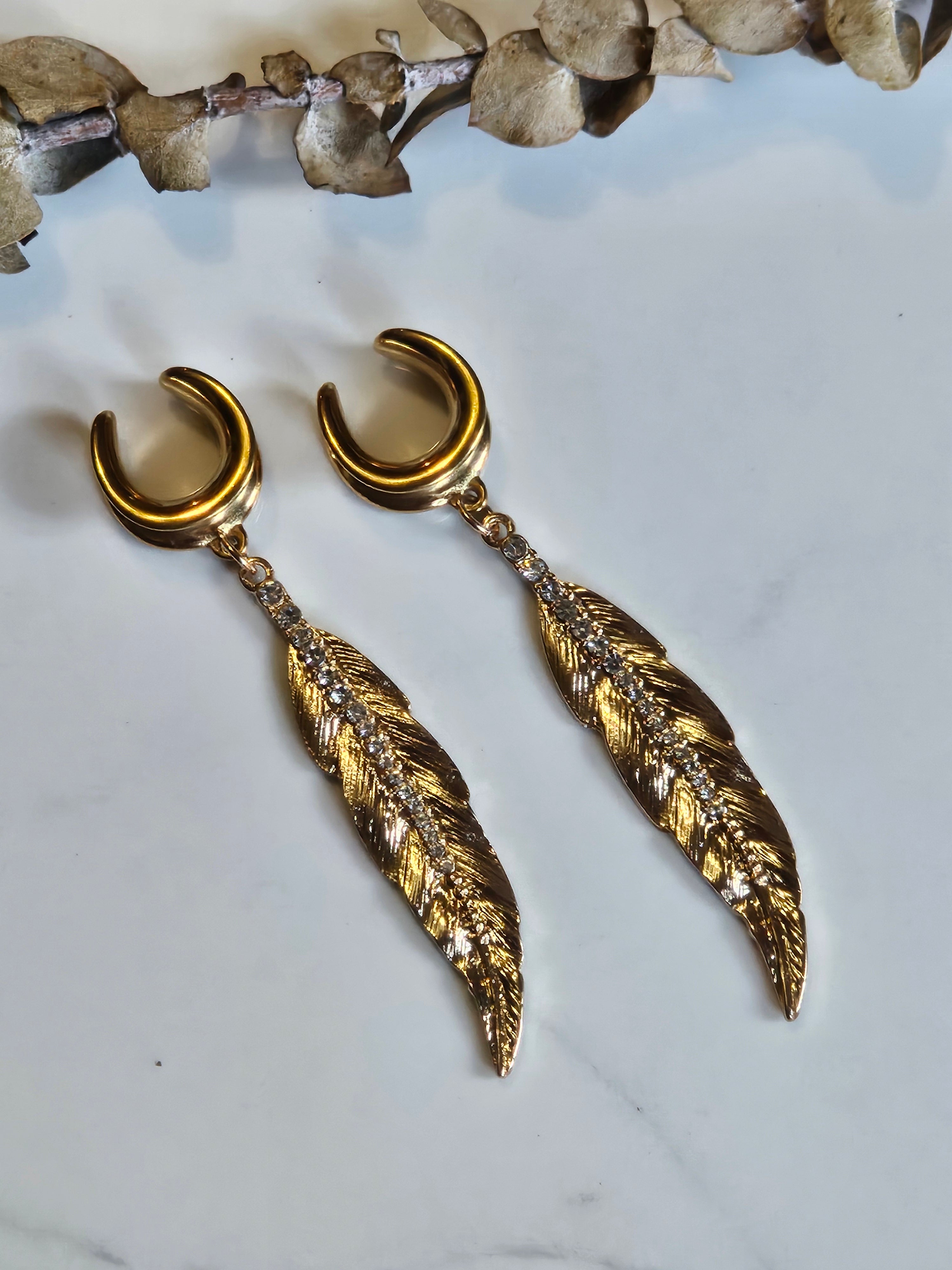 Gold feather saddle gauges