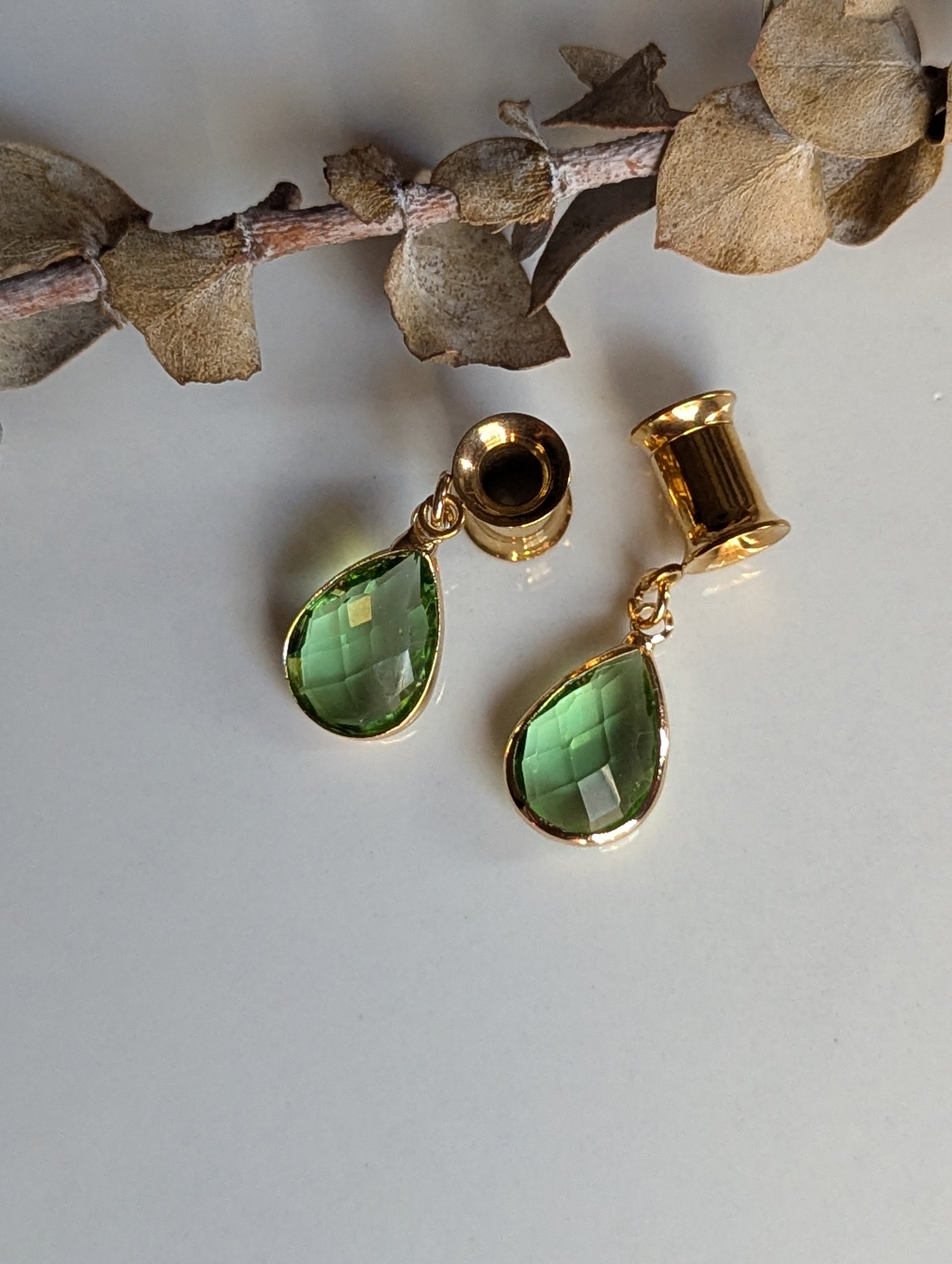 Peridot dangle gauges