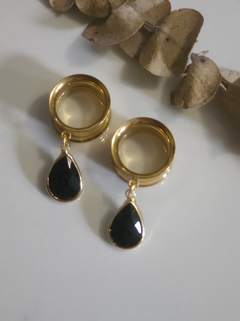 Black glass dangle gauges