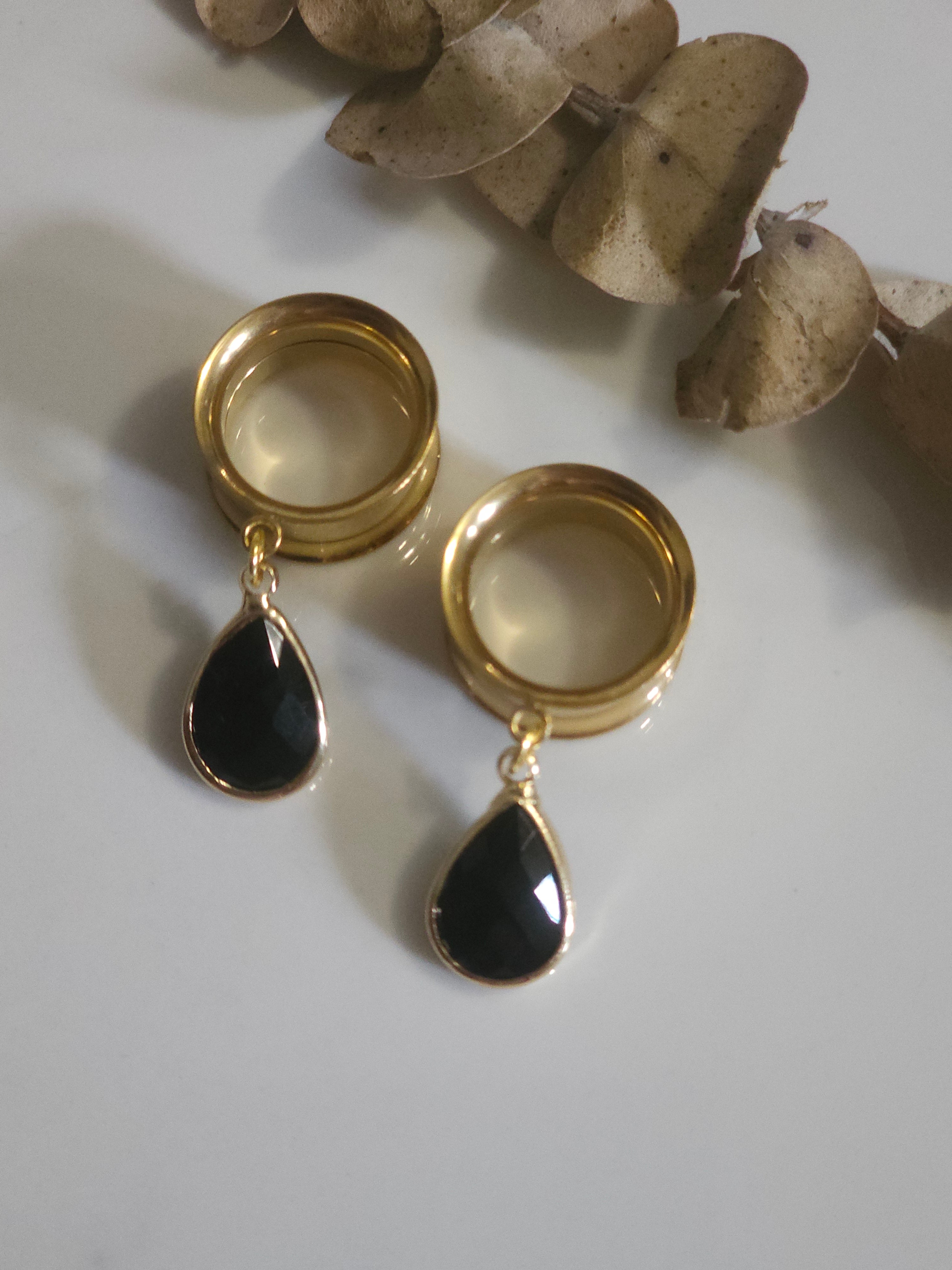 Black glass dangle gauges