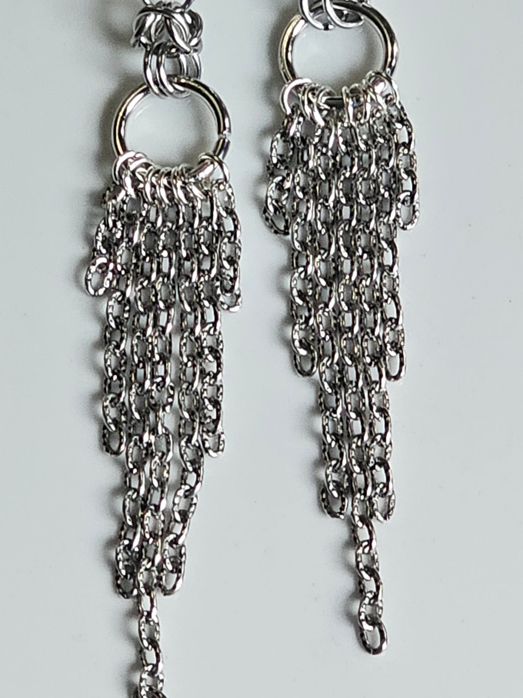 Chain tassel dangle gauges