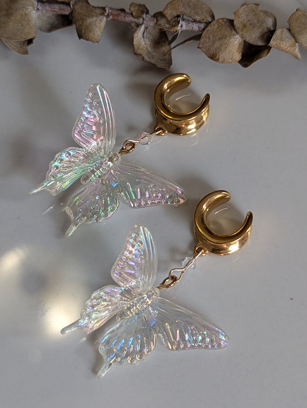 Butterfly saddle gauges