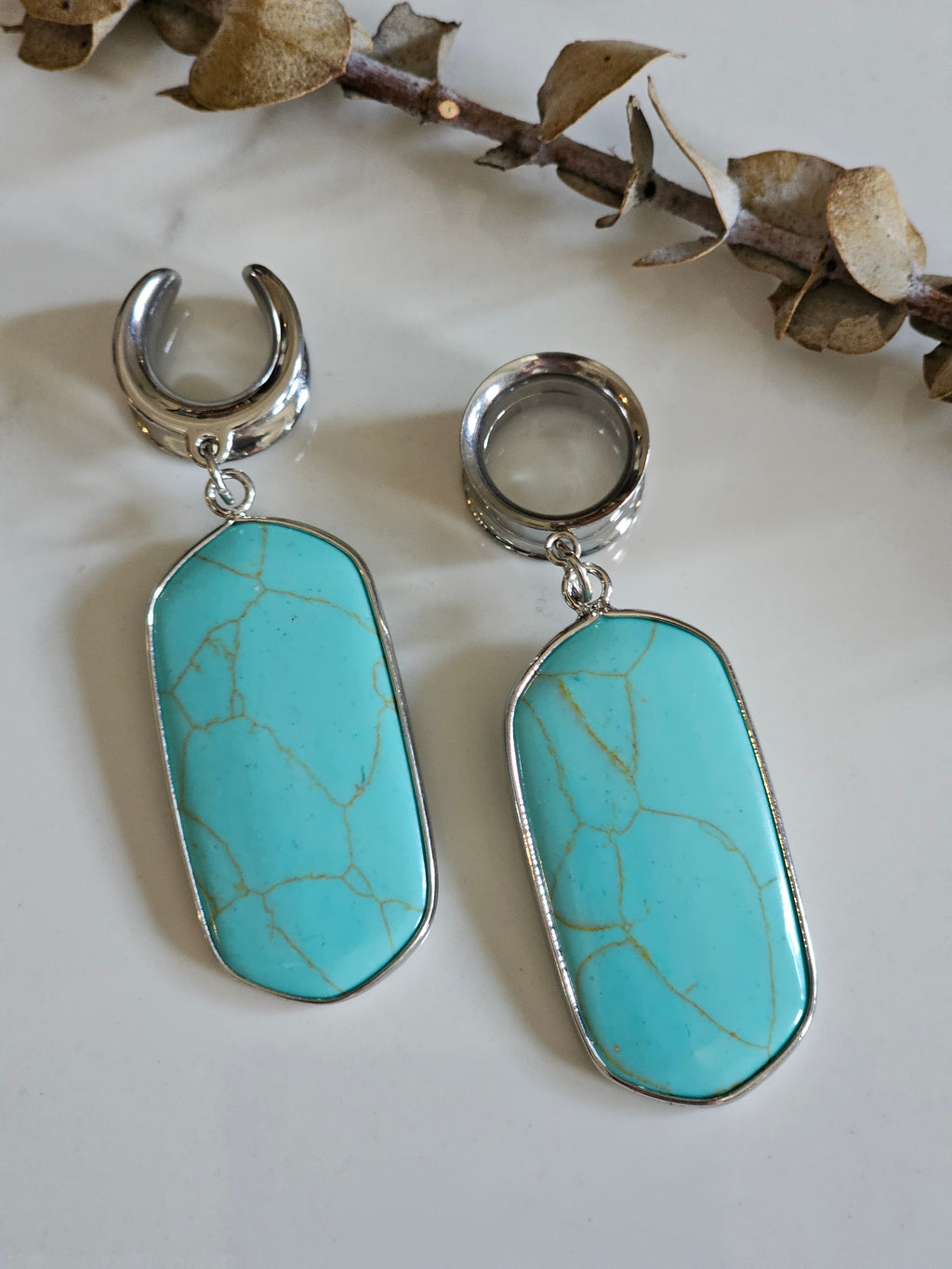 Turquoise saddle gauges