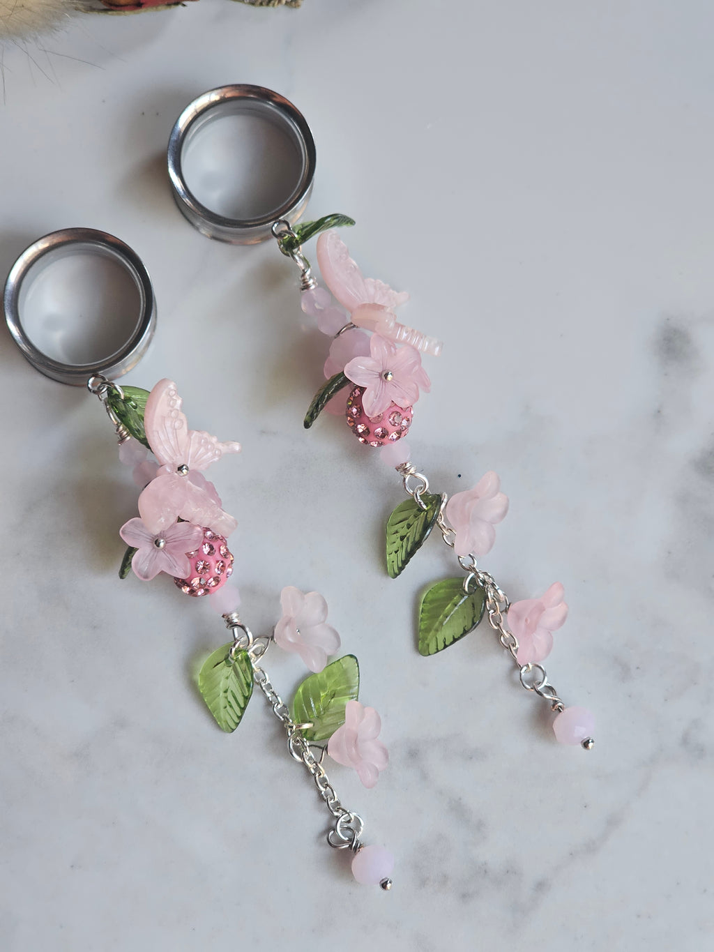Pink floral dangle gauges