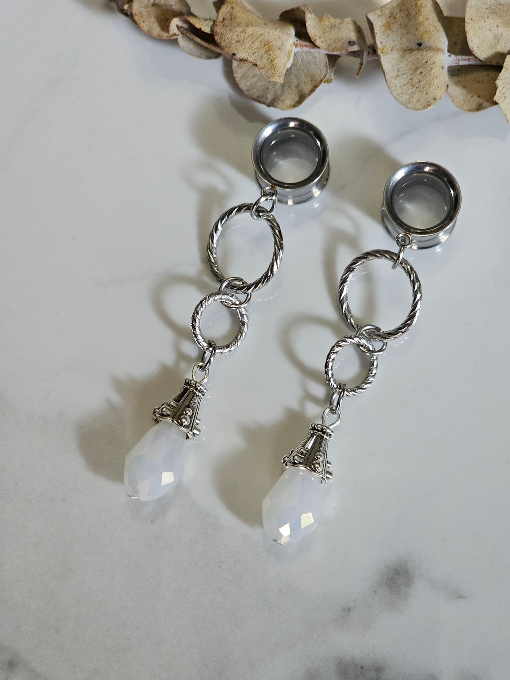White drop dangle gauges