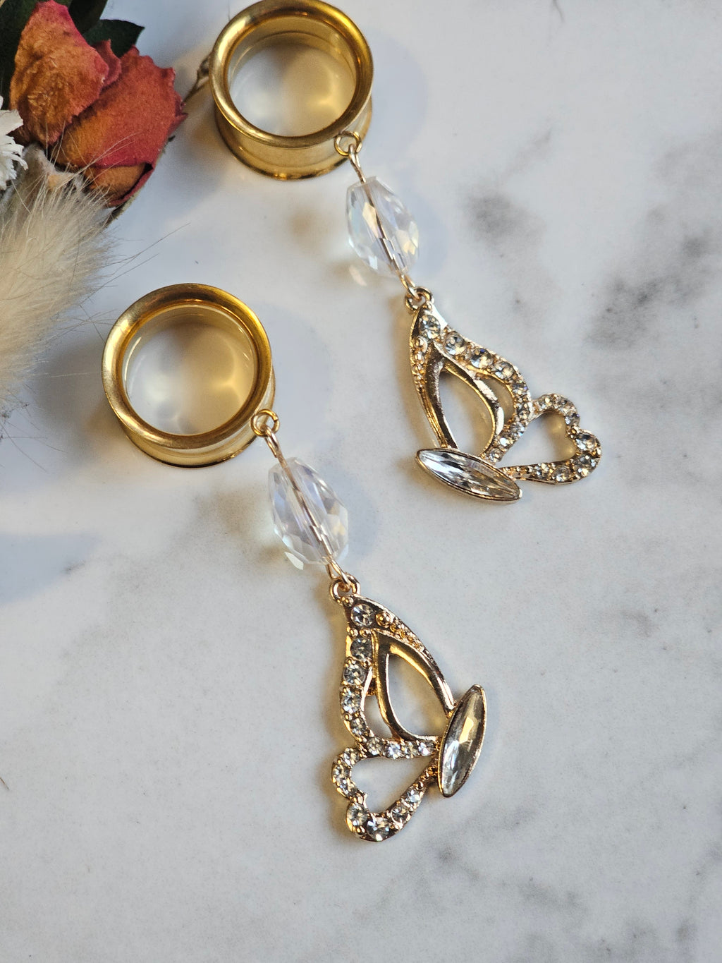Golden butterfly dangle gauges